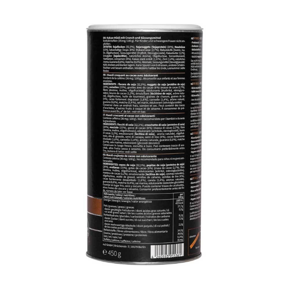 Zylinderförmige Dose mit Text. Zutatenliste, Nährwertangaben. Marke: nu3. Produkt: Fit Müsli Cacao Crunch.