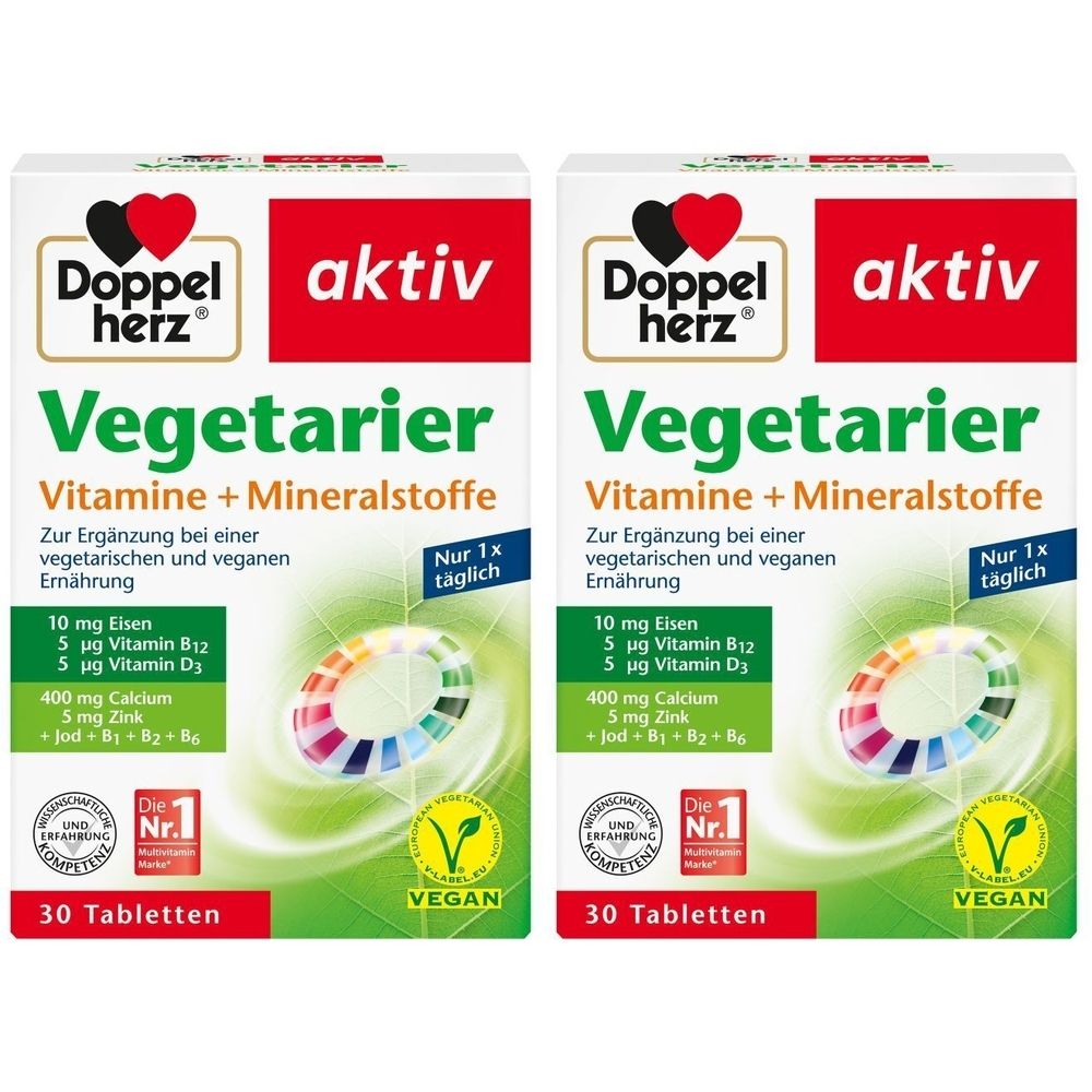 Zwei Packungen Doppelherz aktiv Vegetarier Tabletten. Weiße Verpackung mit rotem Logo und grüner Schrift. Vegan.