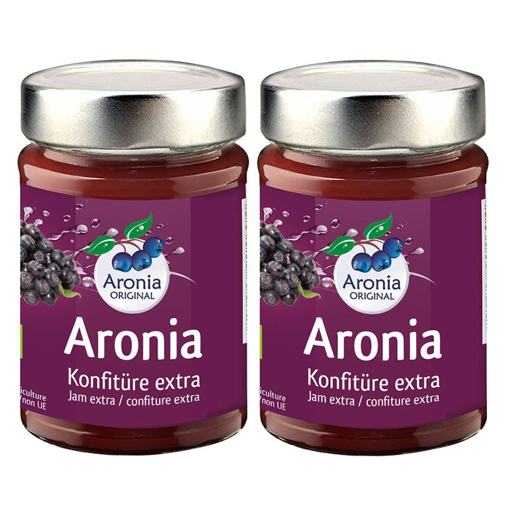 Deux pots de confiture avec couvercles argentés. Étiquettes violettes avec "Aronia Konfitüre extra". Logo avec baies d'aronia.