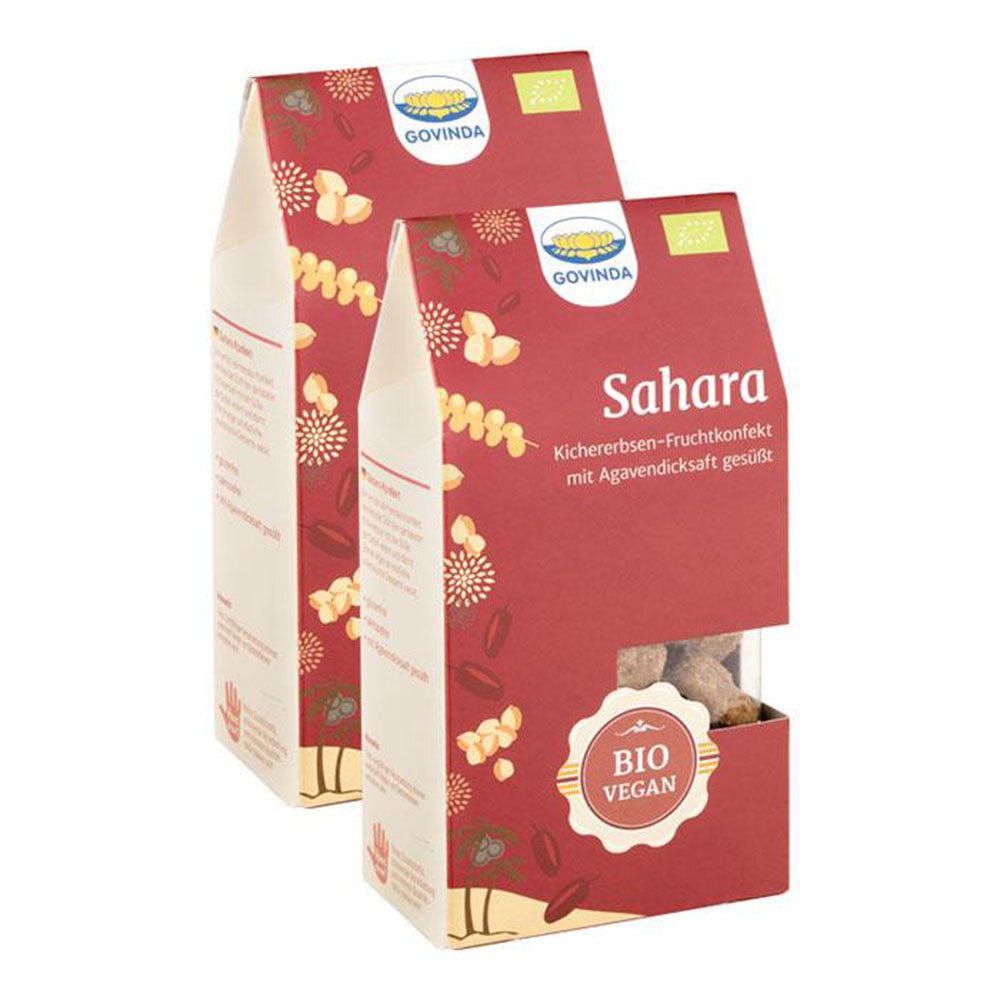 Deux paquets de Govinda Bio Sahara-Konfekt. Emballage rouge avec nom du produit et label Bio Vegan. Fenêtre transparente montrant le contenu.