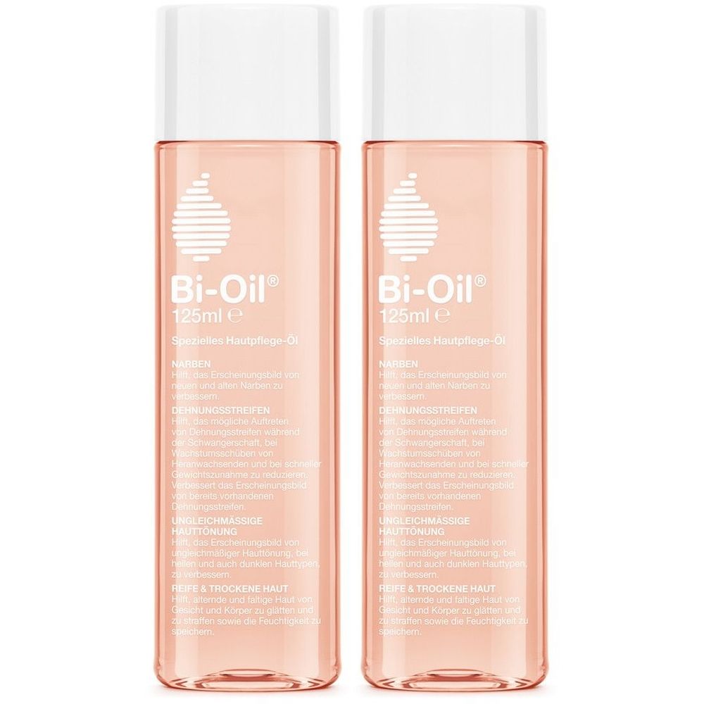 Deux flacons de Bi-Oil® Huile de soin de la peau. Flacons transparents avec bouchon blanc et étiquette. Inscription : Bi-Oil®.
