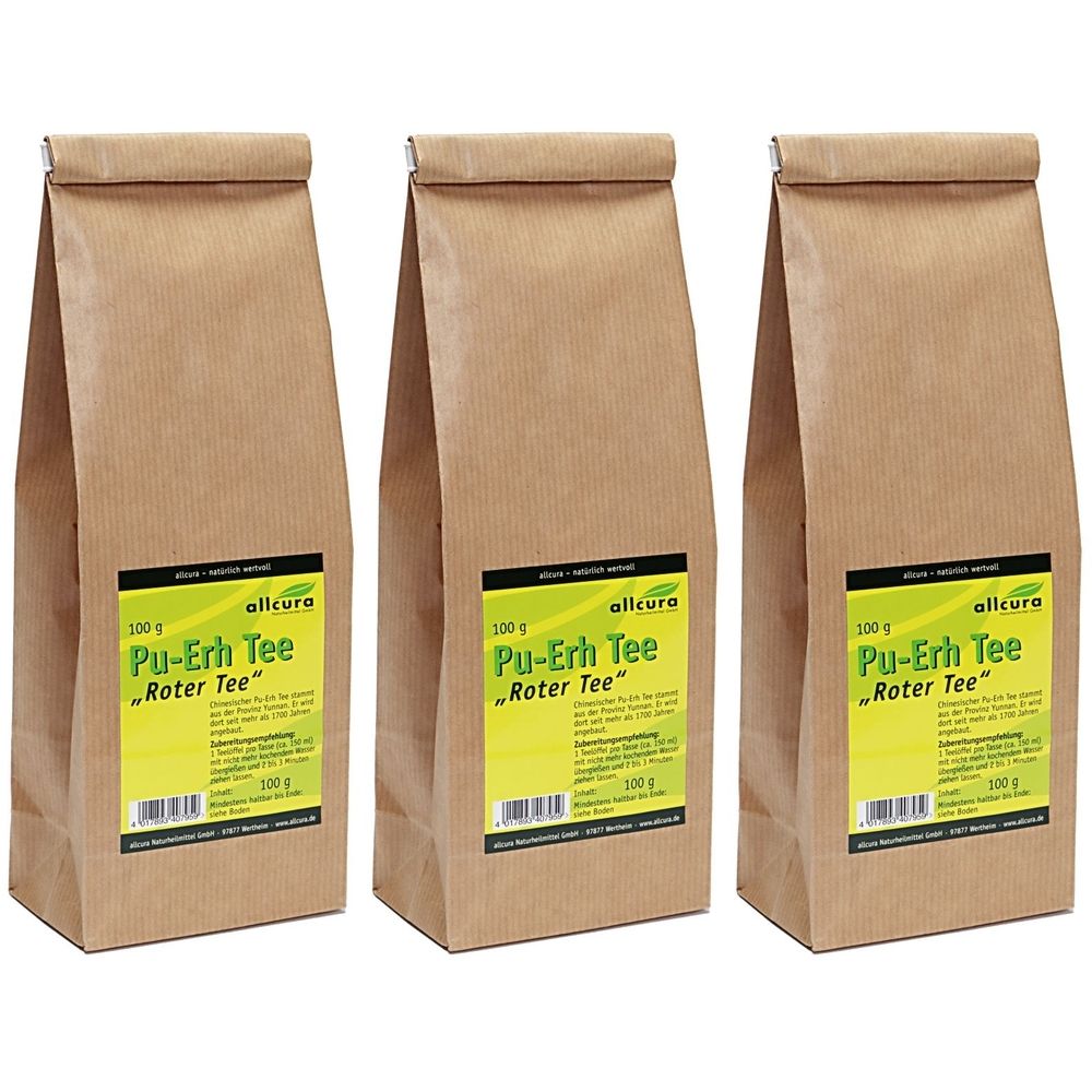 Trois sachets de thé rouge Pu-Erh allcura. Sachets en papier brun avec étiquette verte. Inscription : Pu-Erh Tee, 100 g.