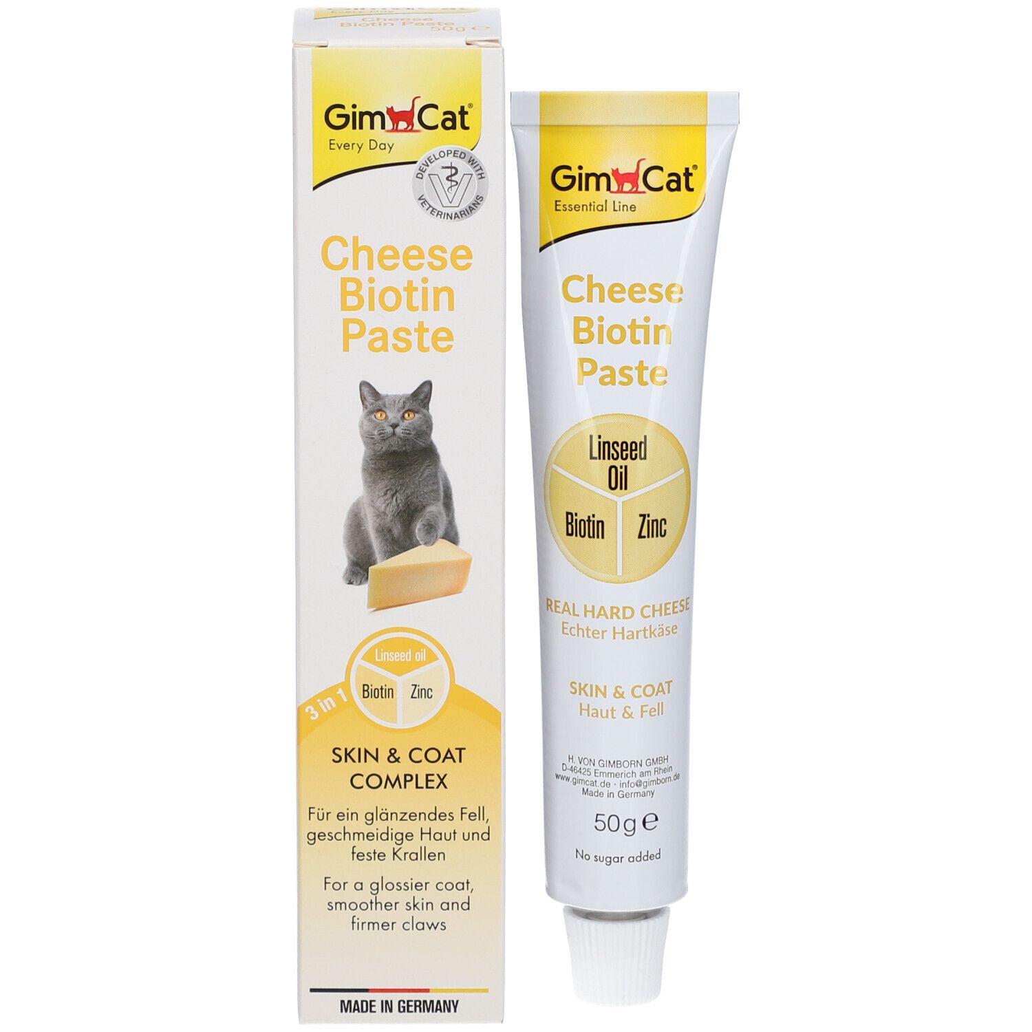 GimCat Cheese Biotin Paste avec emballage. Inscription: Cheese Biotin Paste, Linseed Oil, Biotin, Zinc, Skin & Coat. Chat avec fromage.