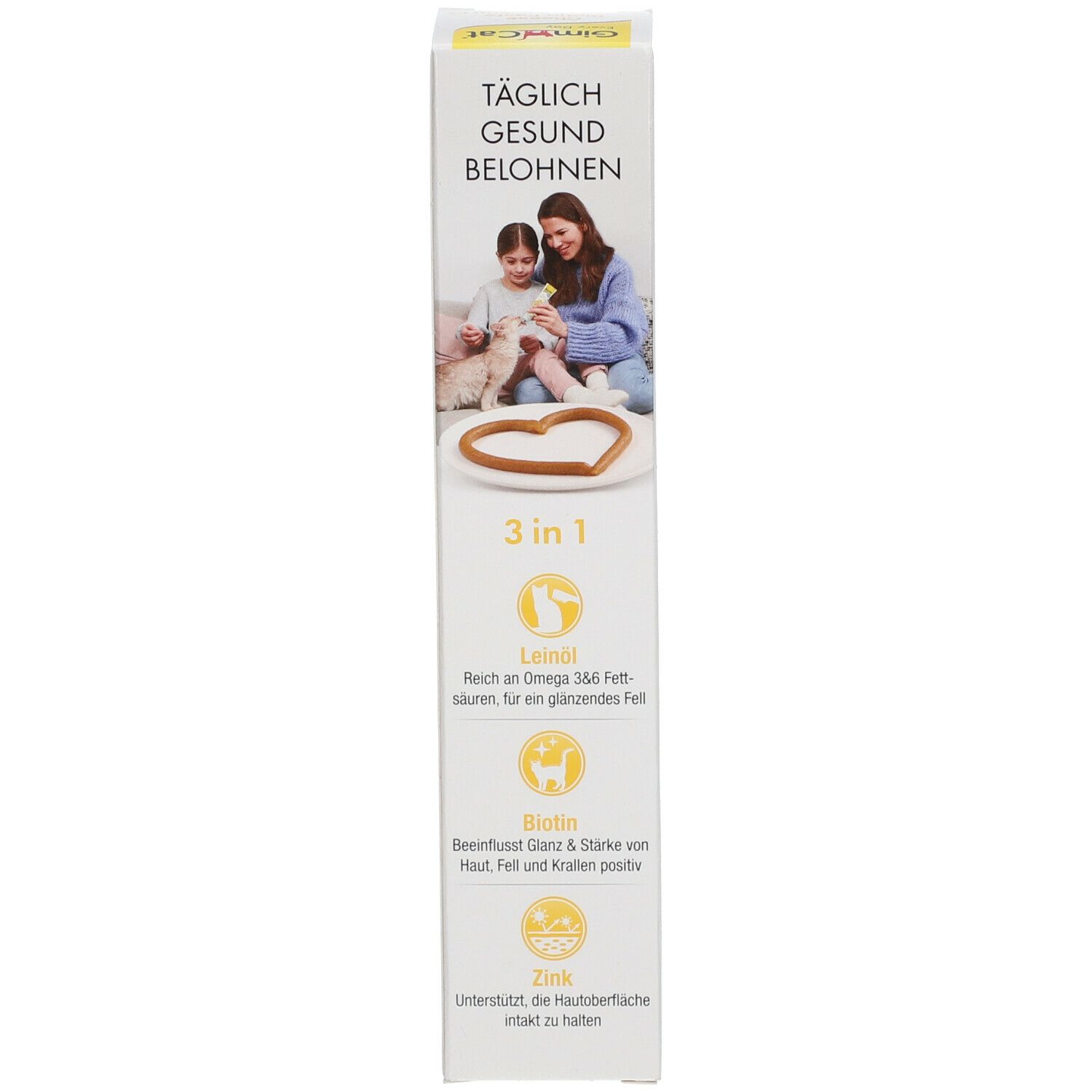 Emballage GimCat Cheese Biotin Paste. Côté avec image d'enfants et chat. Inscription: 3 en 1, Huile de lin, Biotine, Zinc.