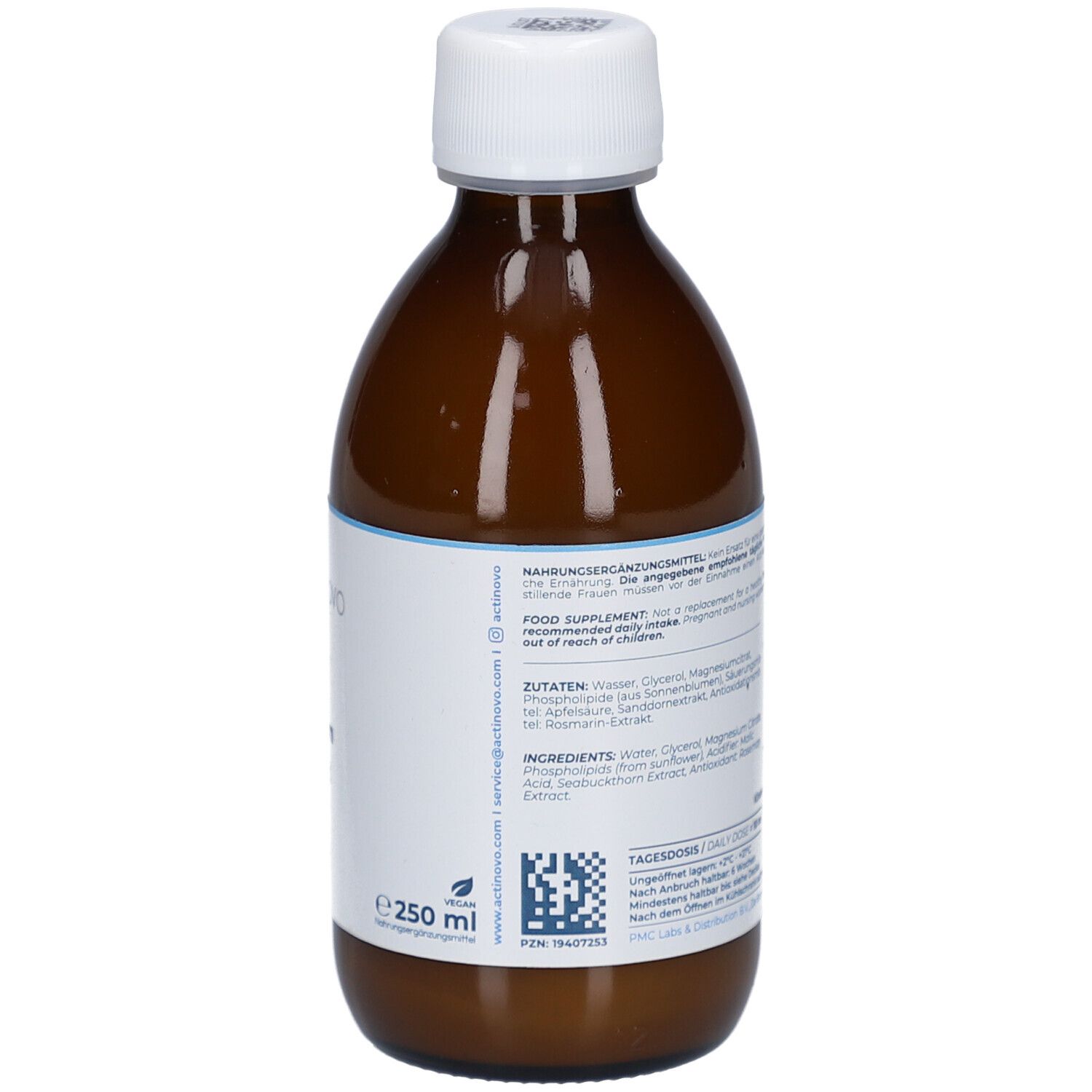 Vue arrière du flacon en verre brun. Étiquette bleue avec texte, ingrédients, informations fabricant, label végétalien.