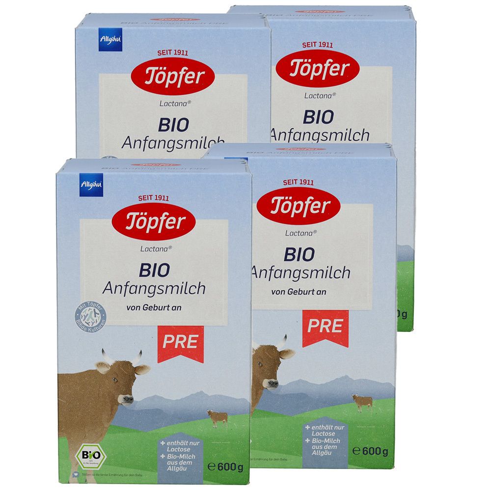 Quatre boîtes de lait infantile Töpfer Lactana Bio. Emballage bleu avec logo, illustration de vache et texte. Indication PRE.