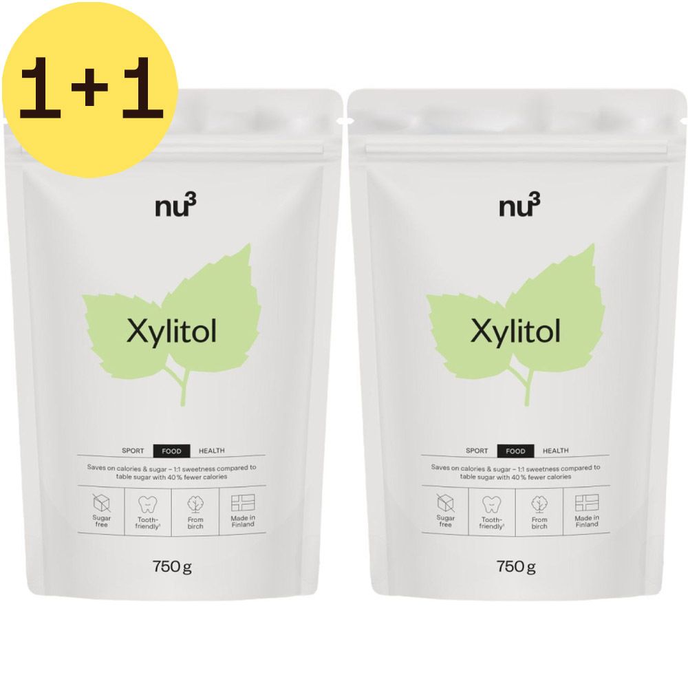 Deux sachets blancs avec impression Xylitol et logo. Inscription : Xylitol, 750g. Sans sucre, bon pour les dents, issu du bouleau.