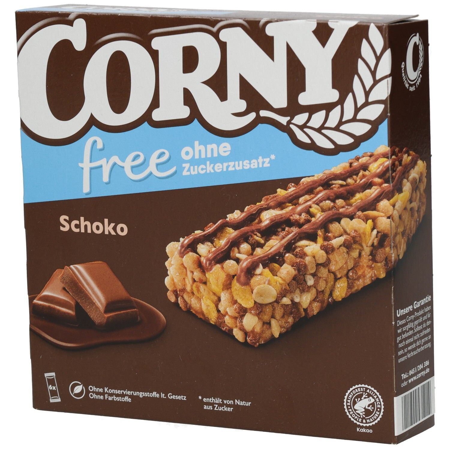 Schachtel mit CORNY free Schoko Riegeln. Braune Verpackung mit Produktabbildung und Text. Enthält 6 Riegel.