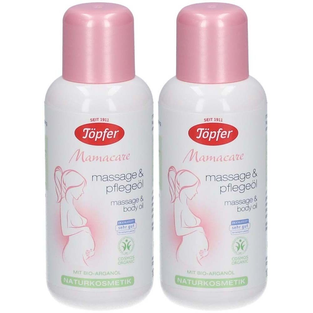 Zwei Flaschen Massage- und Pflegeöl. Weiße Flaschen mit rosa Deckel. Aufschrift: Töpfer Mamacare, Massage & Pflegeöl.