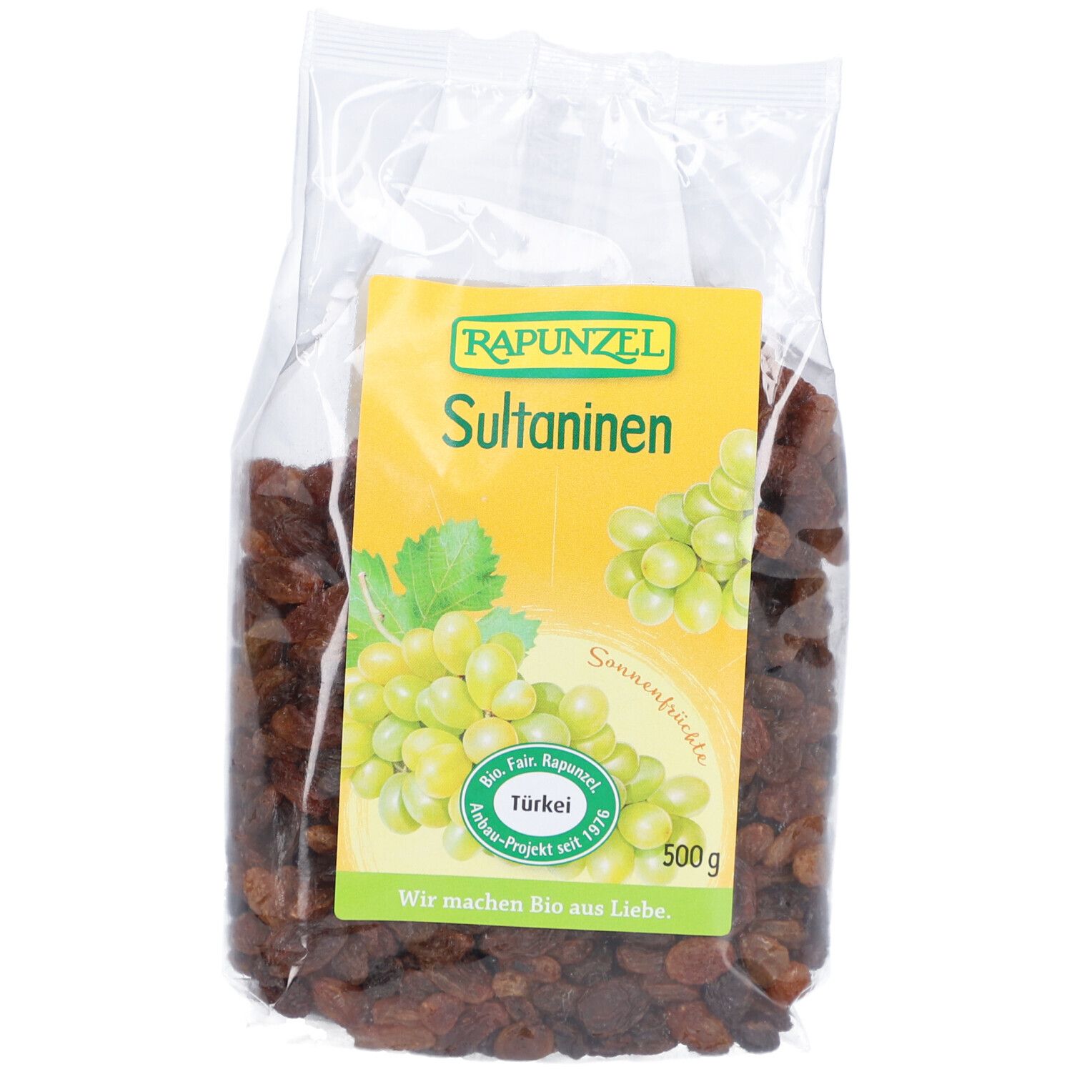 Sachet transparent de raisins secs. Étiquette jaune avec "Rapunzel Sultaninen" et illustration de raisins. 500g.