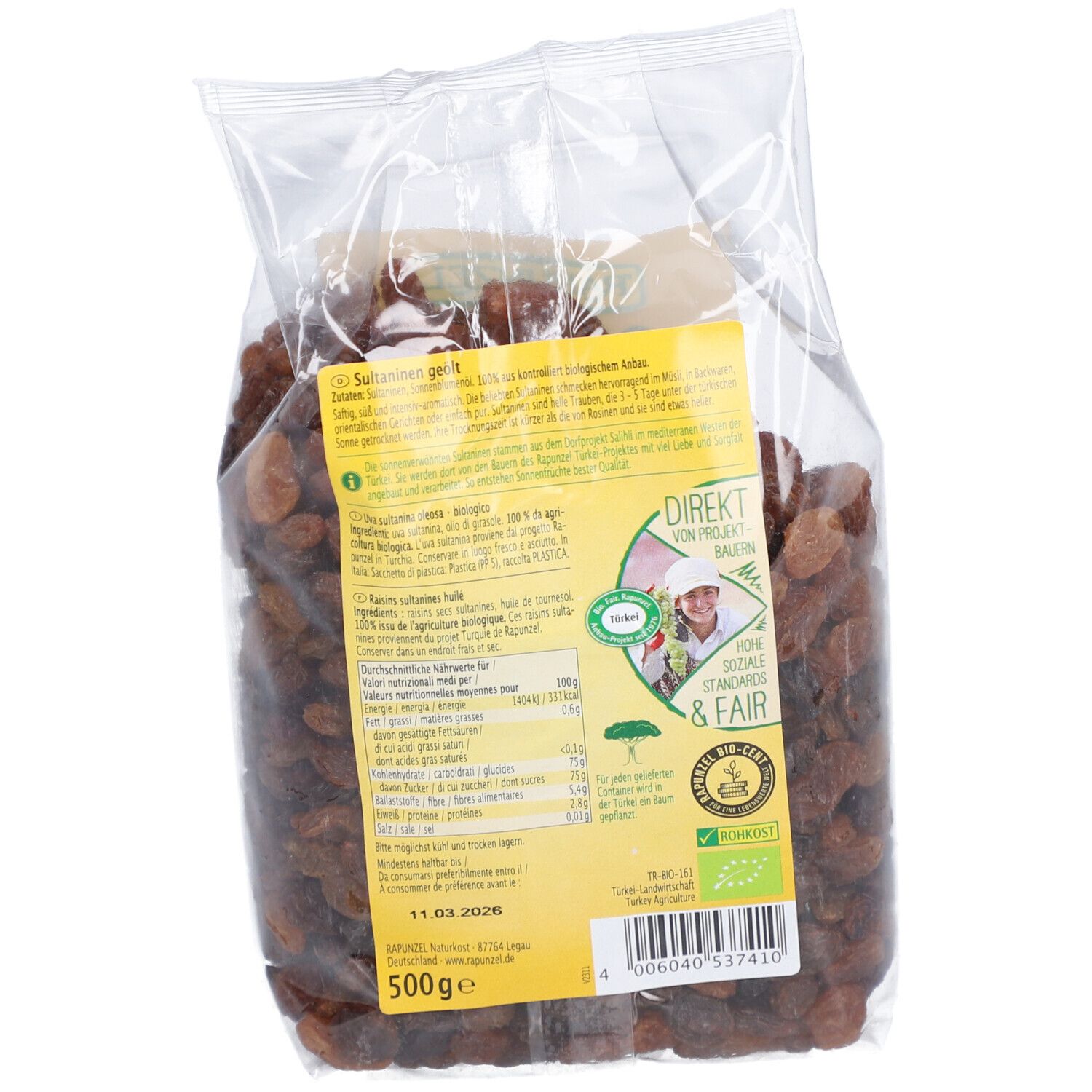Dos du paquet de raisins secs. Sachet transparent avec raisins secs. Étiquette avec texte et informations nutritionnelles. 500g.