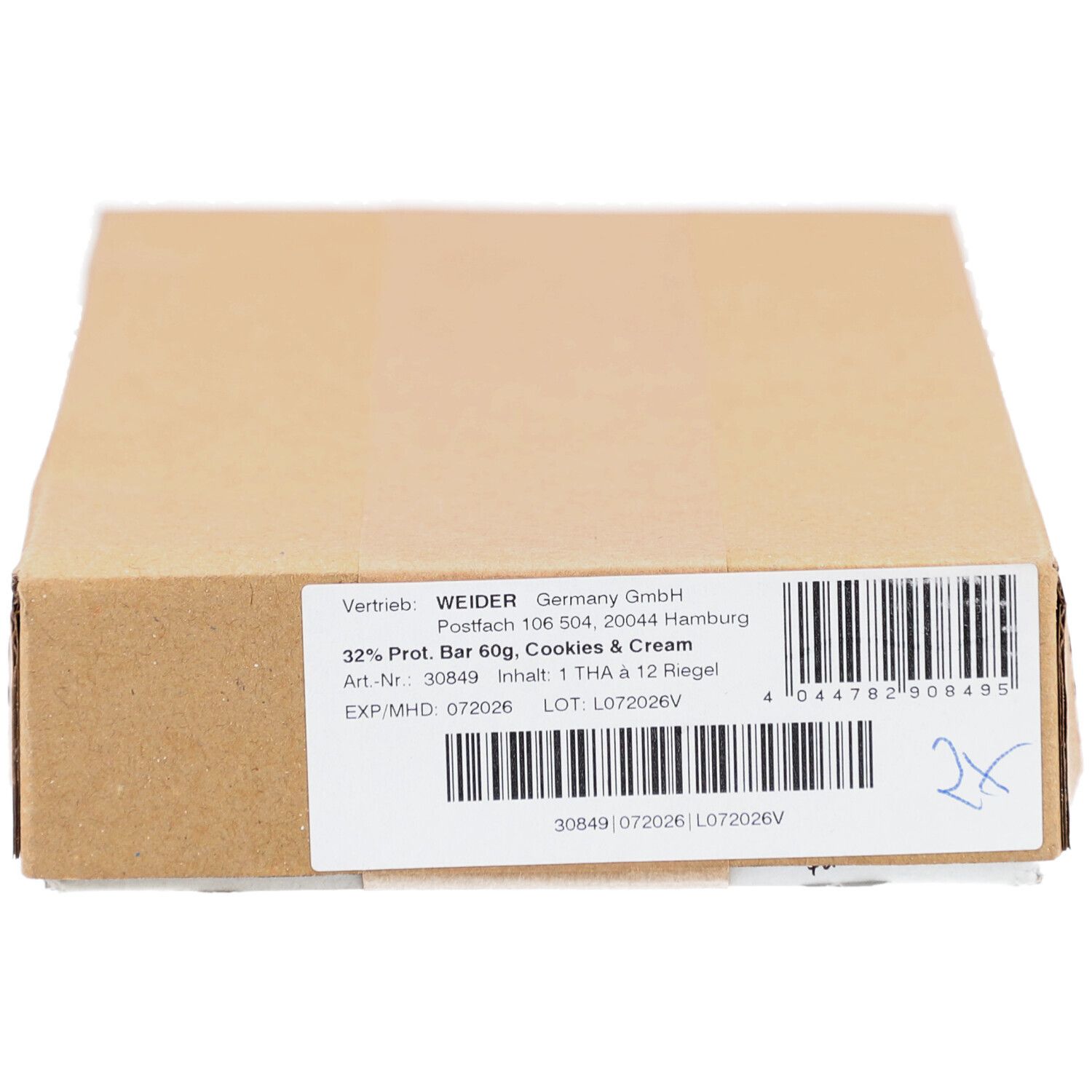 Emballage en carton. Étiquette avec informations produit. Inscription: 32% Prot. Bar 60g, Cookies & Cream. Code-barres.