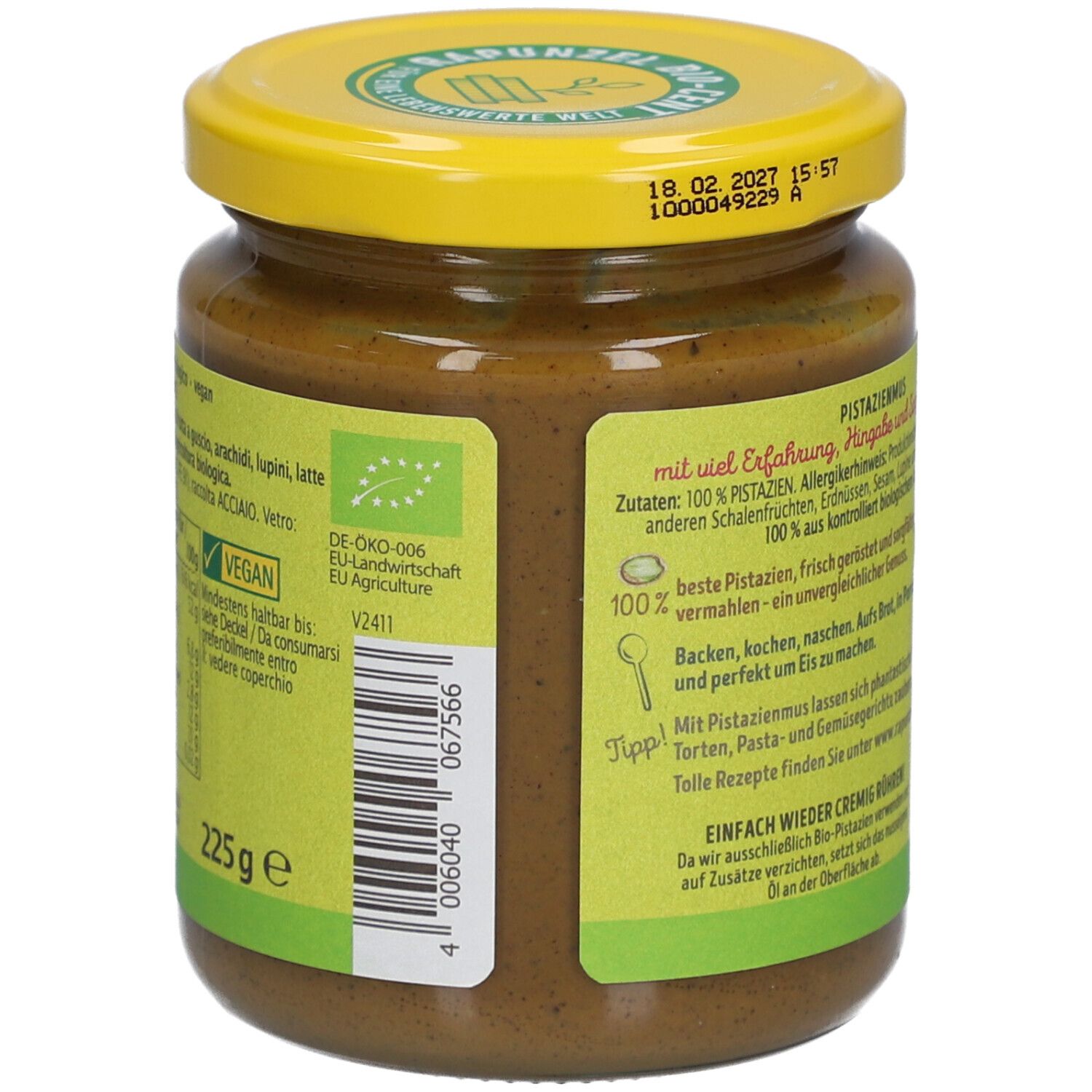 Glas Rapunzel Pistazienmus. Gelber Deckel, grüne Rückseite mit Text und Logo. 225g, vegan.