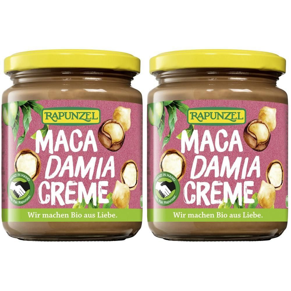 Deux pots de crème de macadamia RAPUNZEL. Crème brune dans des pots avec des couvercles jaunes. Étiquette avec texte et noix.