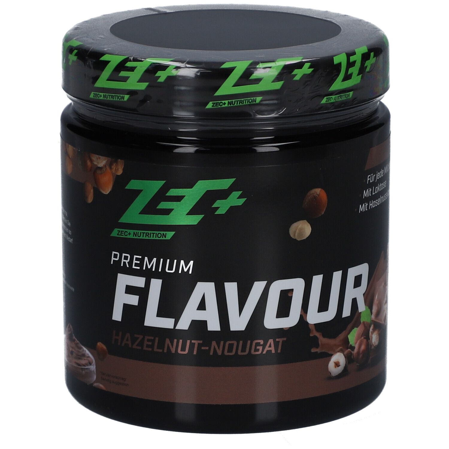 Pot avec couvercle vert. Inscription: ZEC+ NUTRITION. PREMIUM FLAVOUR HAZELNUT-NOUGAT. 250g e.