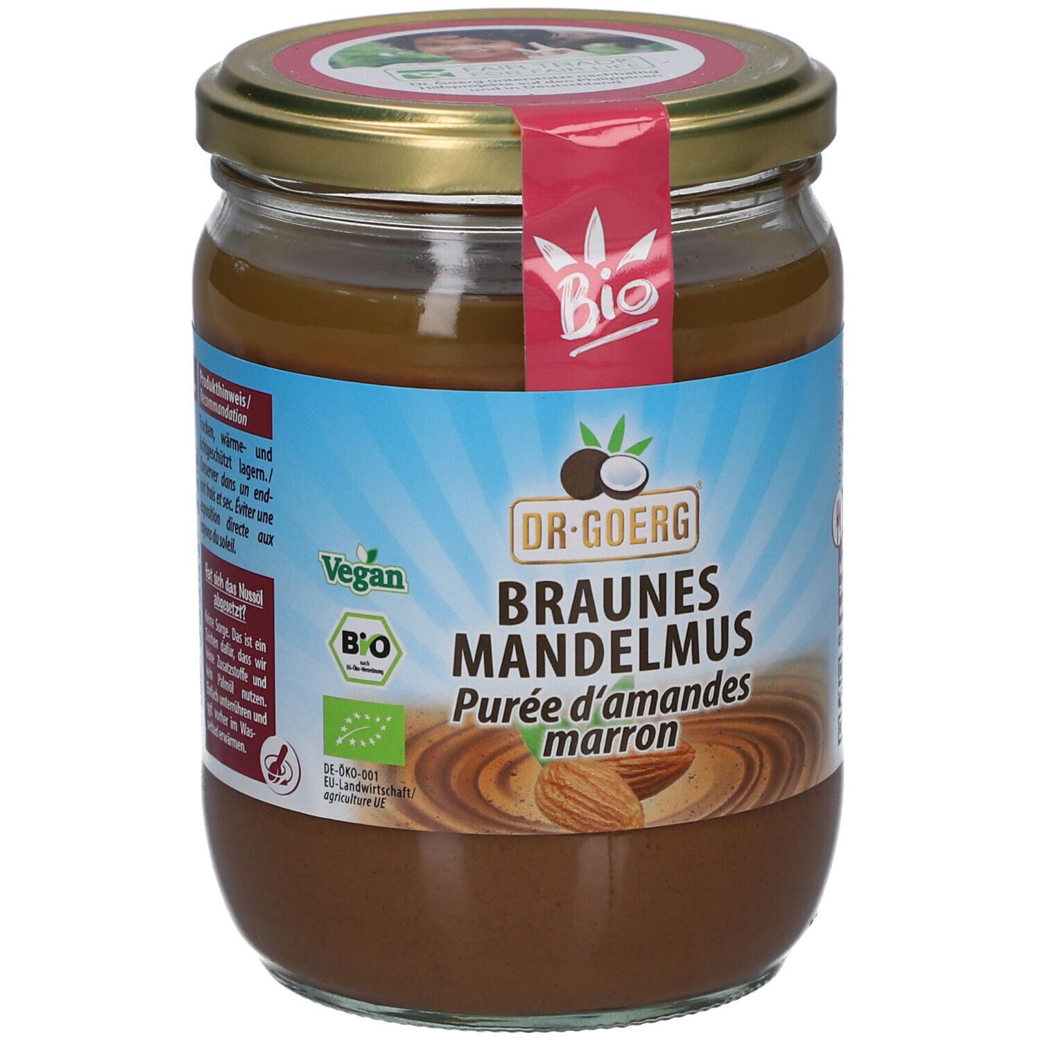 Glas mit braunem Mandelmus. Aufschrift: Dr. Goerg, Braunes Mandelmus, Bio, Vegan. Mandel-Abbildung.