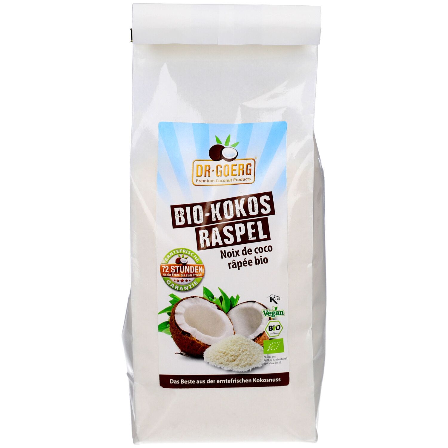 Transparente Verpackung mit Aufdruck. BIO-Kokosraspel, Kokosnuss-Illustration, Logo und Text. Siegel: Bio, Vegan.