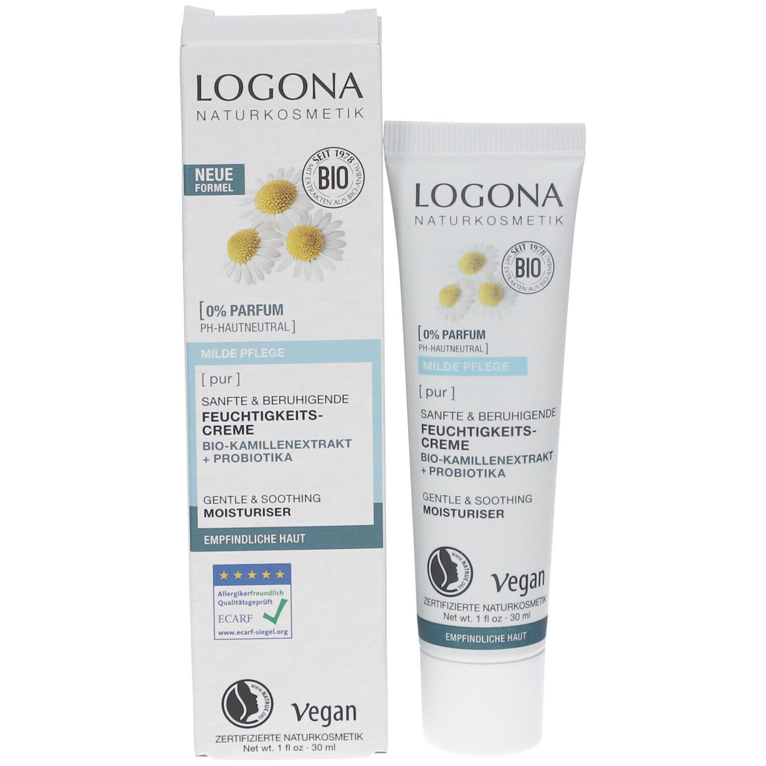 Emballage du produit avec tube de crème et carton. Logo LOGONA, fleurs de camomille, texte. Vegan, peaux sensibles.