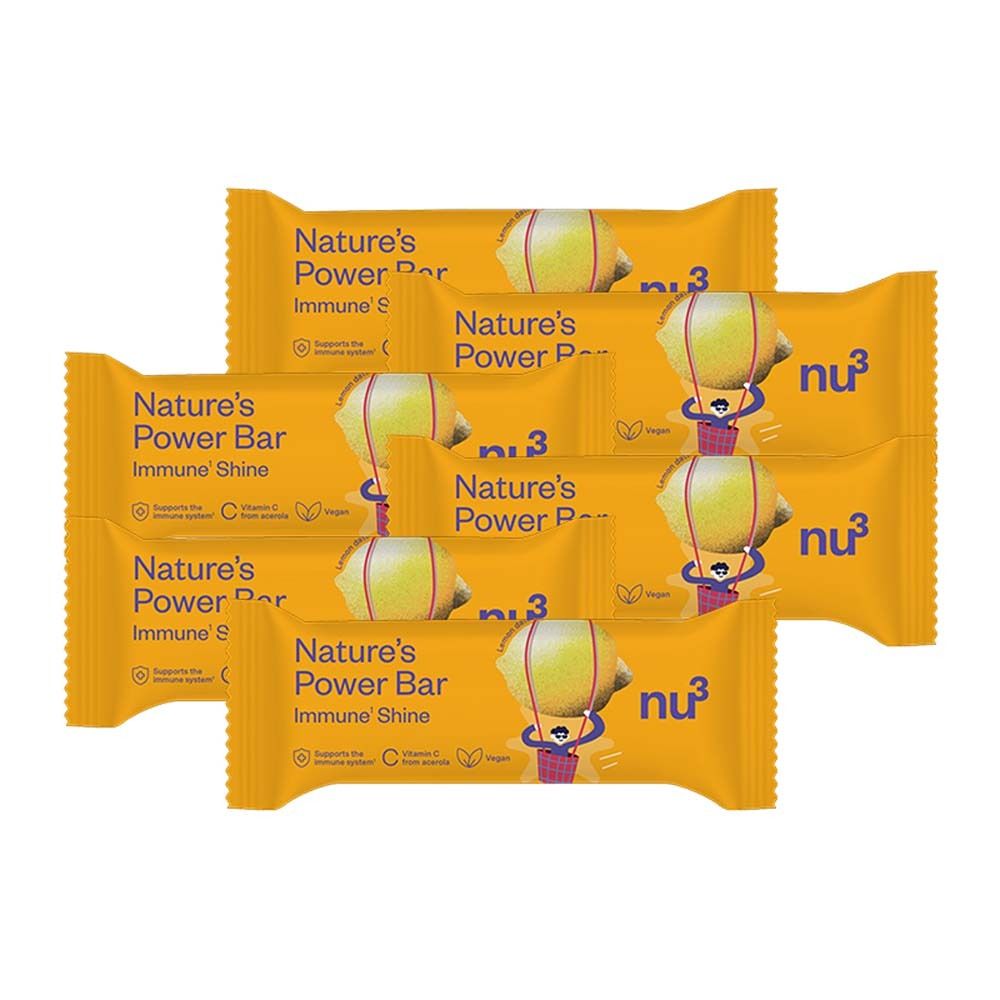 Sechs gelbe Riegel mit der Aufschrift "Nature's Power Bar Immune Shine" und dem Logo "nu3". Auf jedem Riegel ist ein Ballon abgebildet.