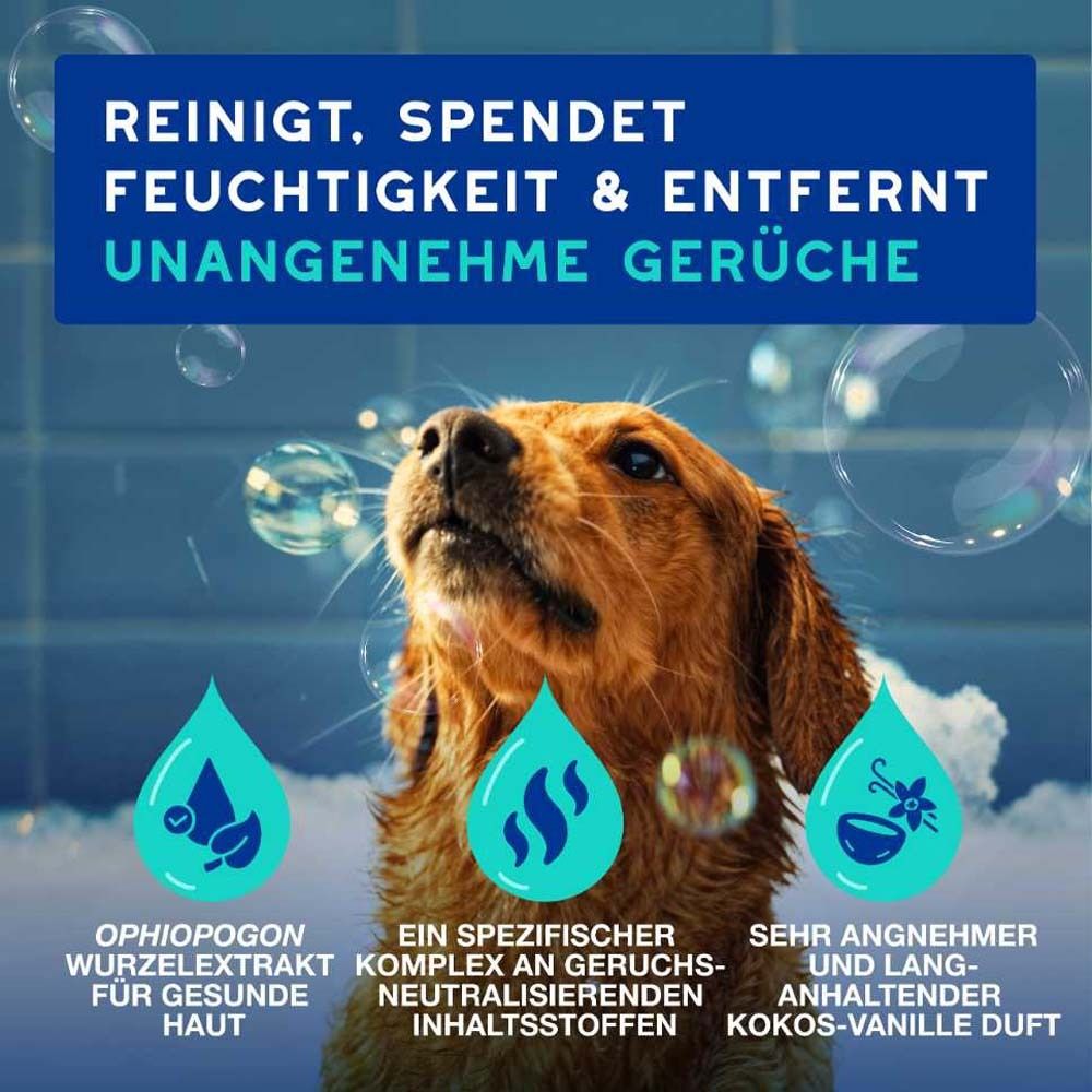 Hund im Bad mit Seifenblasen. Text: Reinigt, spendet Feuchtigkeit & entfernt unangenehme Gerüche. Ophiopogon Wurzelextrakt, Kokos-Vanille Duft.