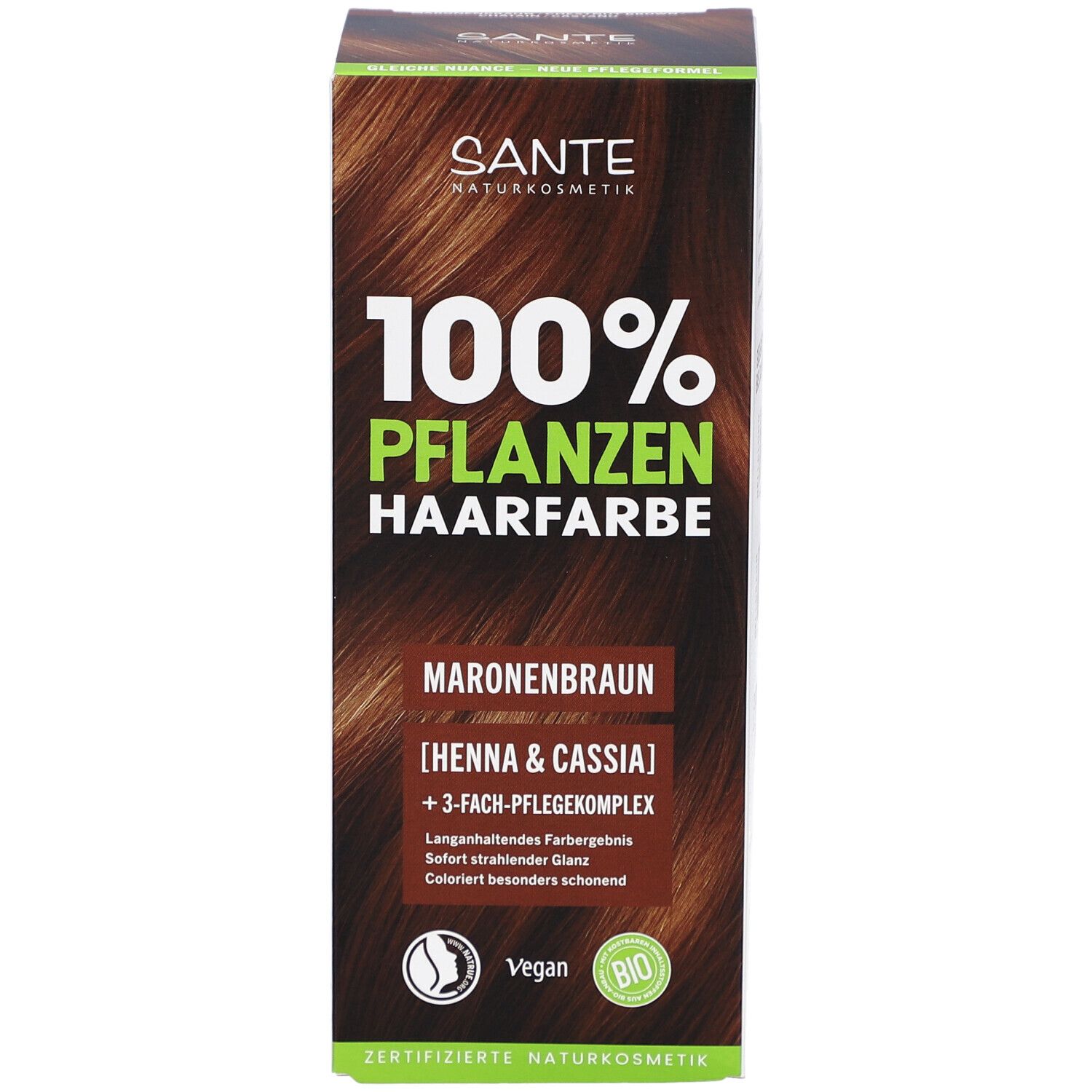 Face avant de l'emballage de la coloration végétale. Inscription: 100% Pflanzenhaarfarbe, Maronenbraun. Logo Vegan et label Bio.