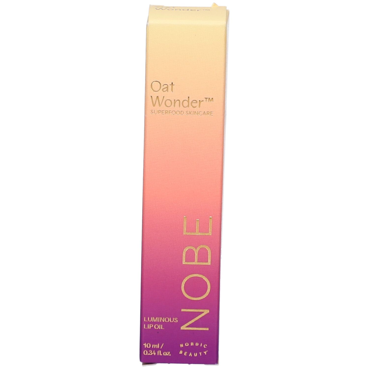 Verpackung von NOBE Oat Wonder Luminous Lip Oil mit Farbverlauf.