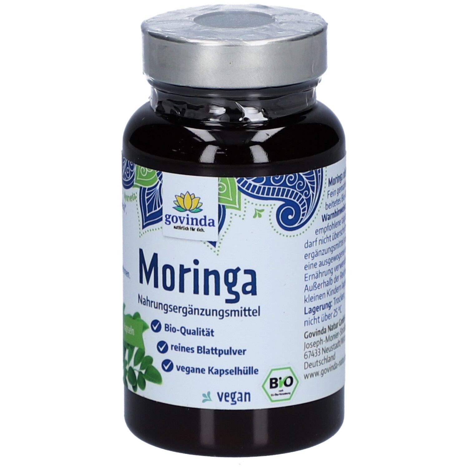 Flacon en verre brun avec couvercle argenté. Inscription : Moringa complément alimentaire, qualité biologique, végétalien.