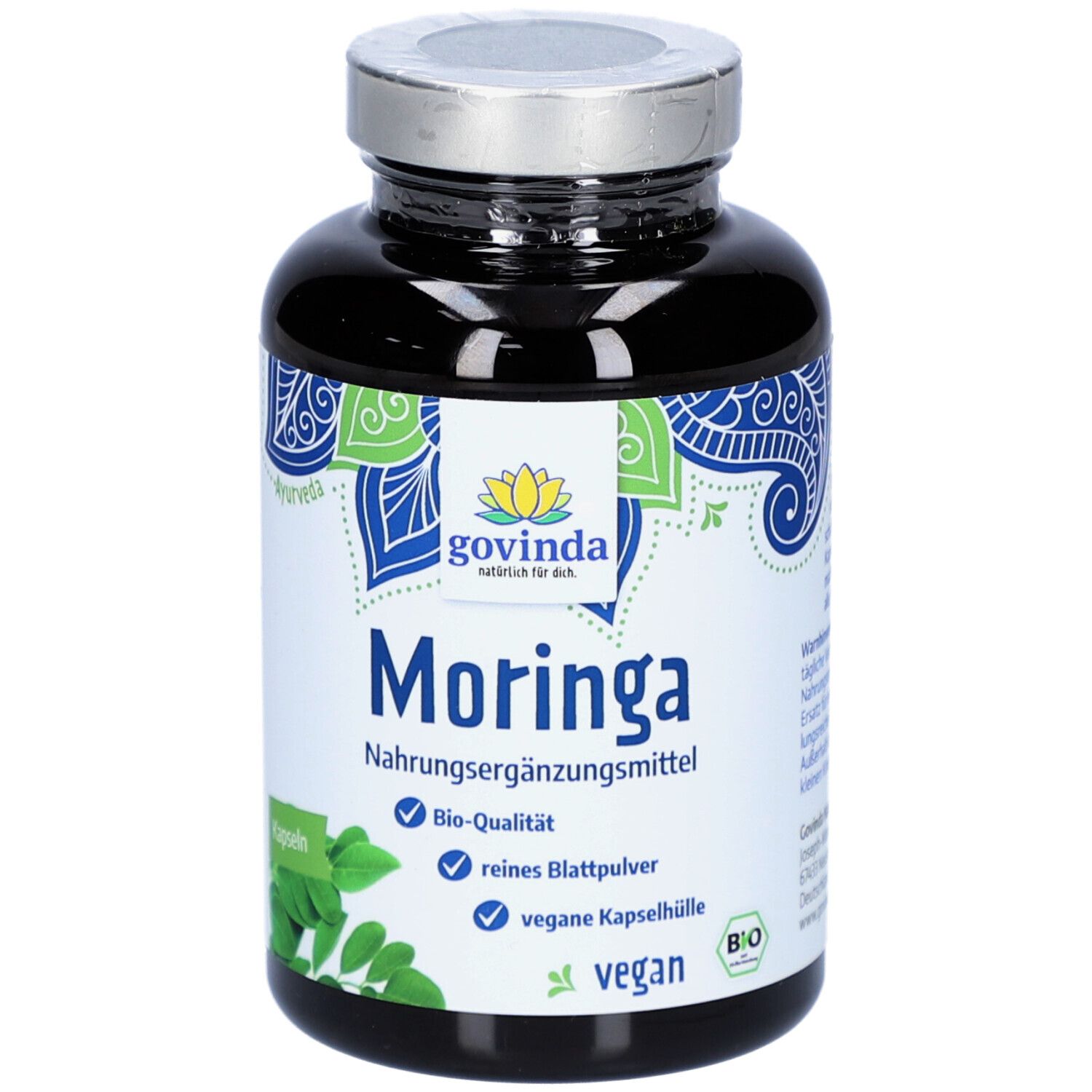 Flacon sombre de gélules de Moringa. Inscription : Govinda Moringa, complément alimentaire, qualité bio, végétalien.