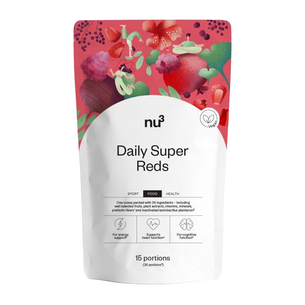 Sachet « nu3 Daily Super Reds ». Sachet blanc avec motif floral rouge. Label végan. Texte : « 15 portions ».
