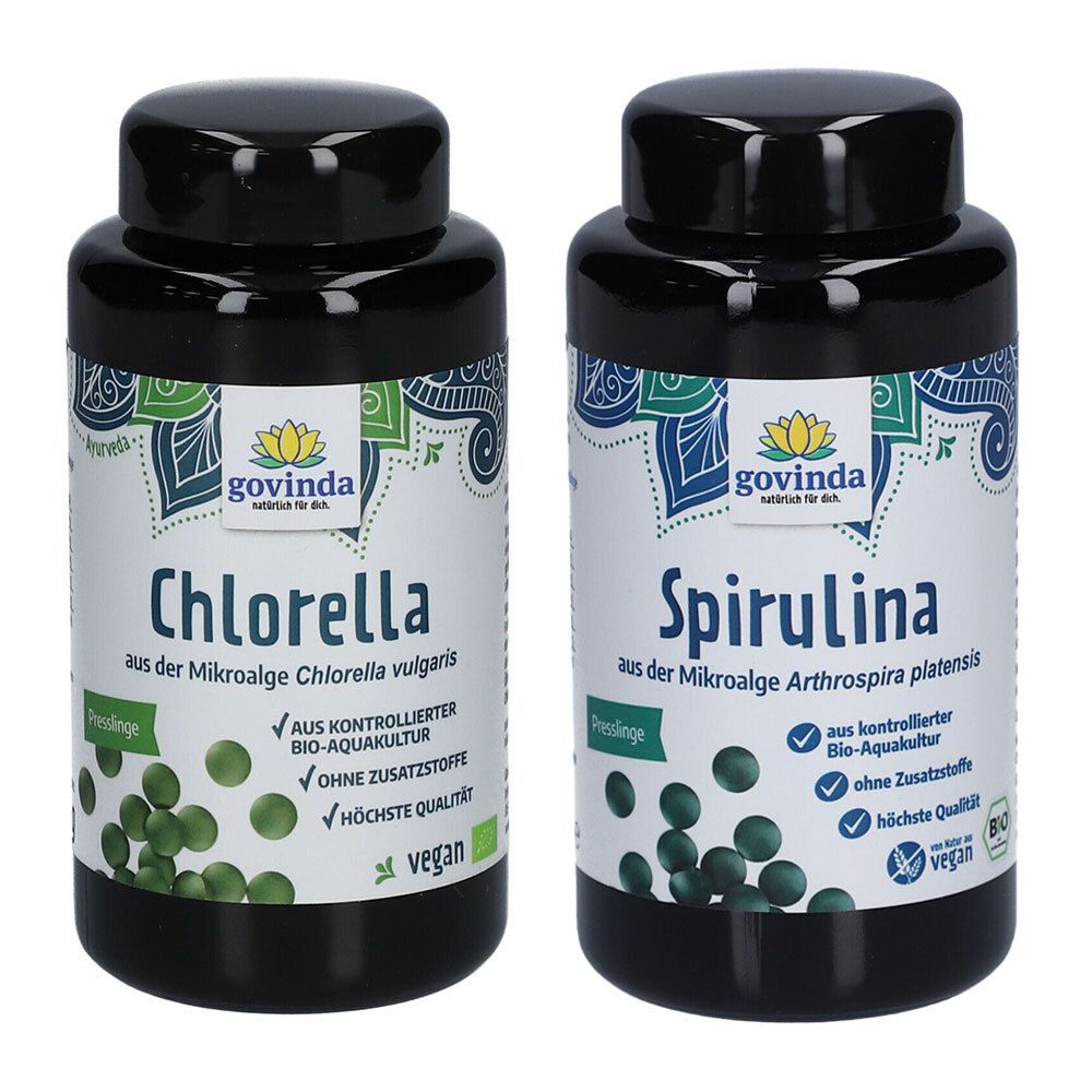 Deux flacons noirs avec étiquettes. Inscription : Govinda Chlorella et Spirulina. Label végétalien. Tablettes vertes illustrées.