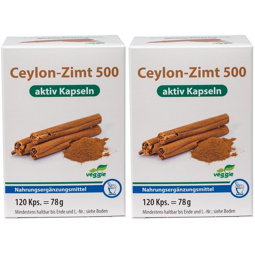 Deux boîtes blanches de Ceylon-Zimt 500 aktiv Kapseln. Image de bâtons et poudre de cannelle. 120 Kps. = 78g.