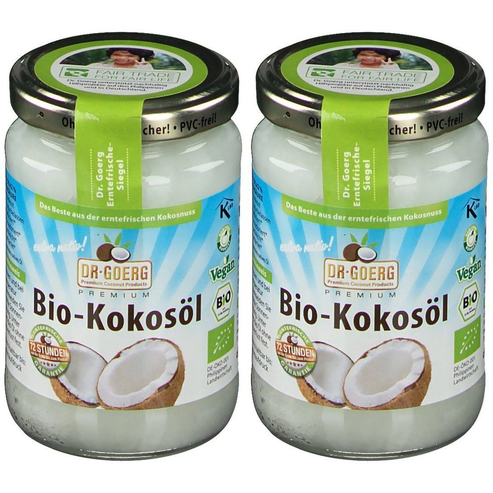 Deux pots de Bio-Kokosöl. Inscription : Dr. Goerg Premium Bio-Kokosöl. Avec label Fair Trade et logo Vegan. Récipients en verre avec bouchon à vis.