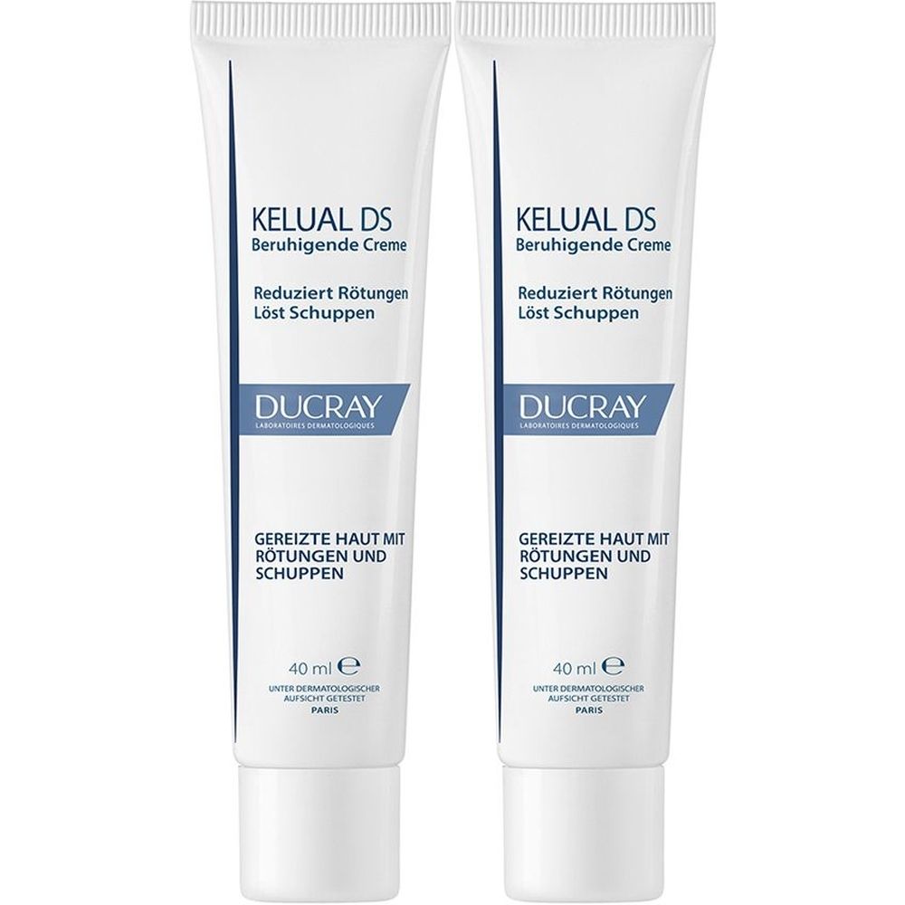 Deux tubes de crème DUCRAY KELUAL DS. Blanc, texte bleu. Crème apaisante, réduit les rougeurs, élimine les squames. 40 ml.