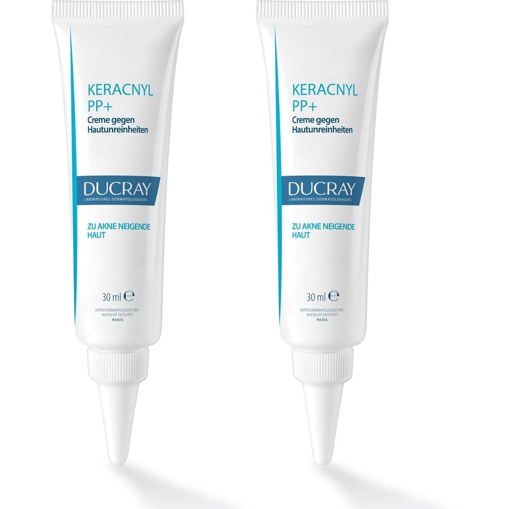 Deux tubes blancs avec texte bleu. Inscription: KERACNYL PP+ Creme gegen Hautunreinheiten, DUCRAY, 30 ml.