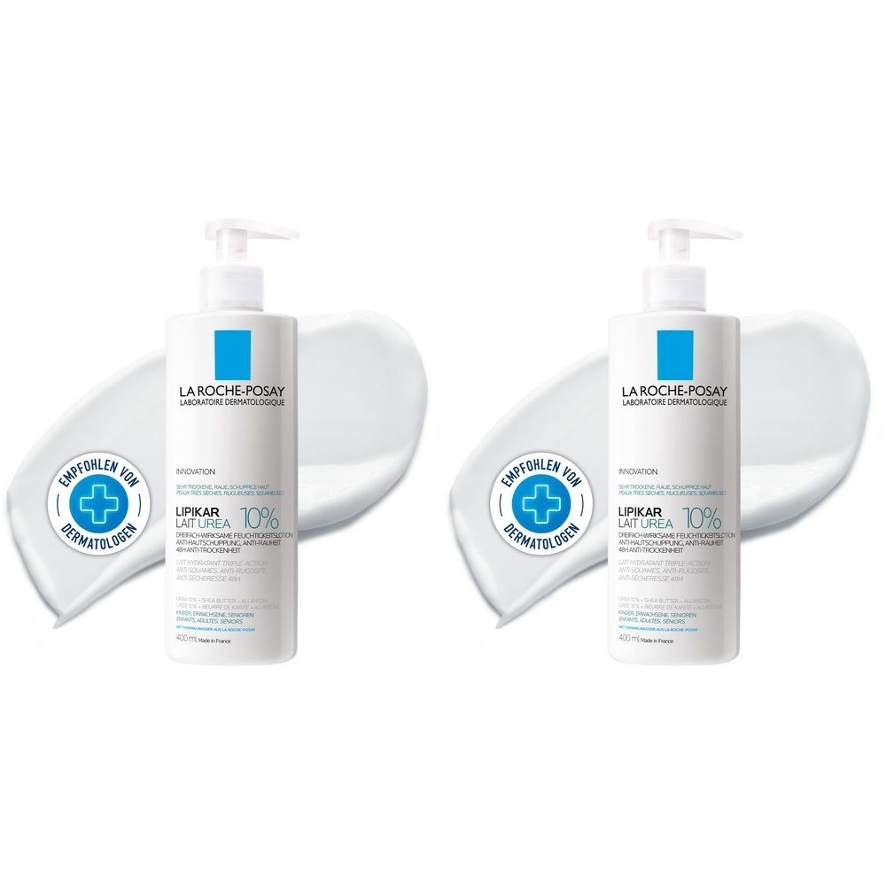 Deux flacons de La Roche-Posay Lipikar Lait Urea 10% avec pompe. Inscription : Recommandé par les dermatologues. Traces de lotion blanche.