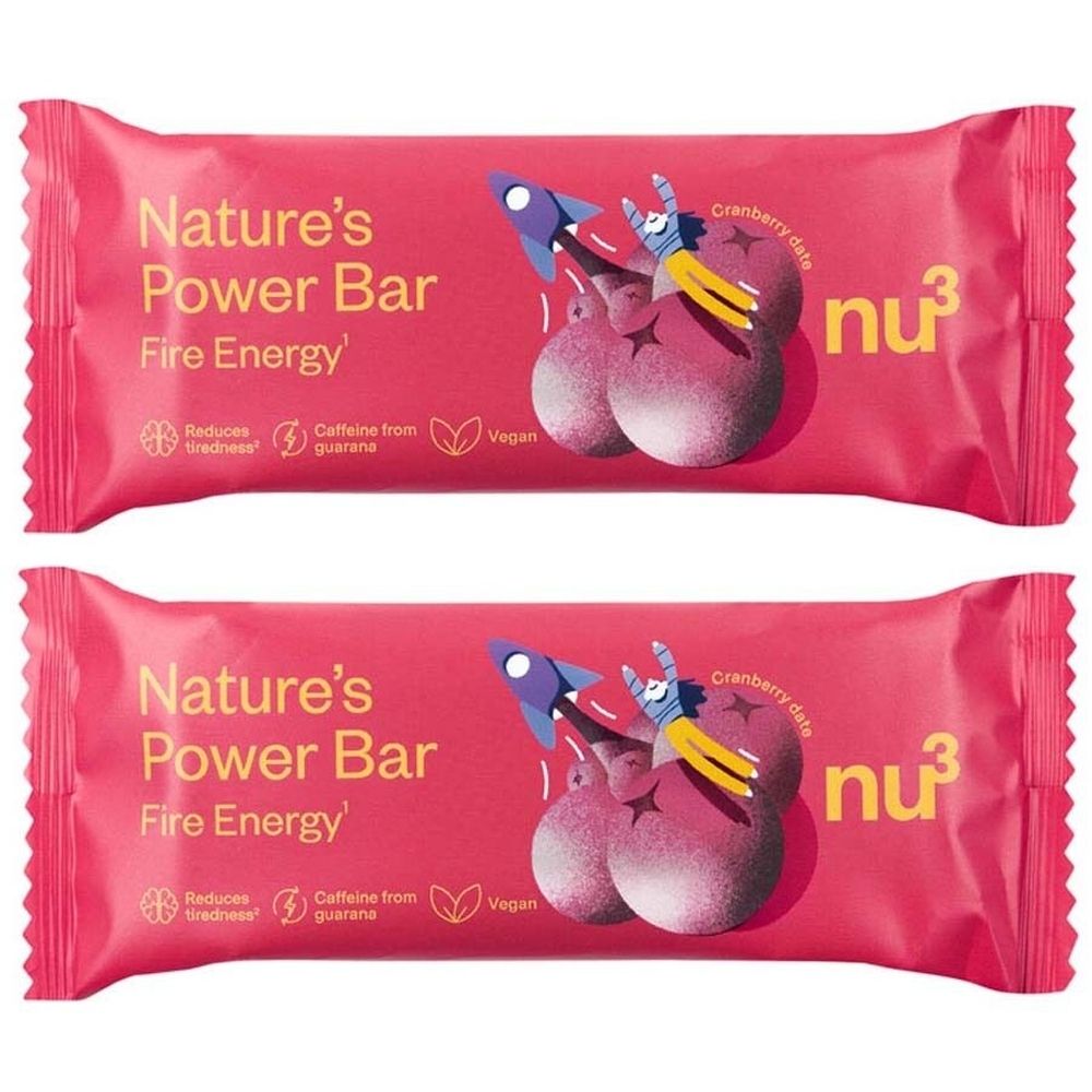 Deux barres "Nature's Power Bar Fire Energy" dans un emballage rose. Avec illustrations et textes tels que "Vegan" et "Cranberry Date".