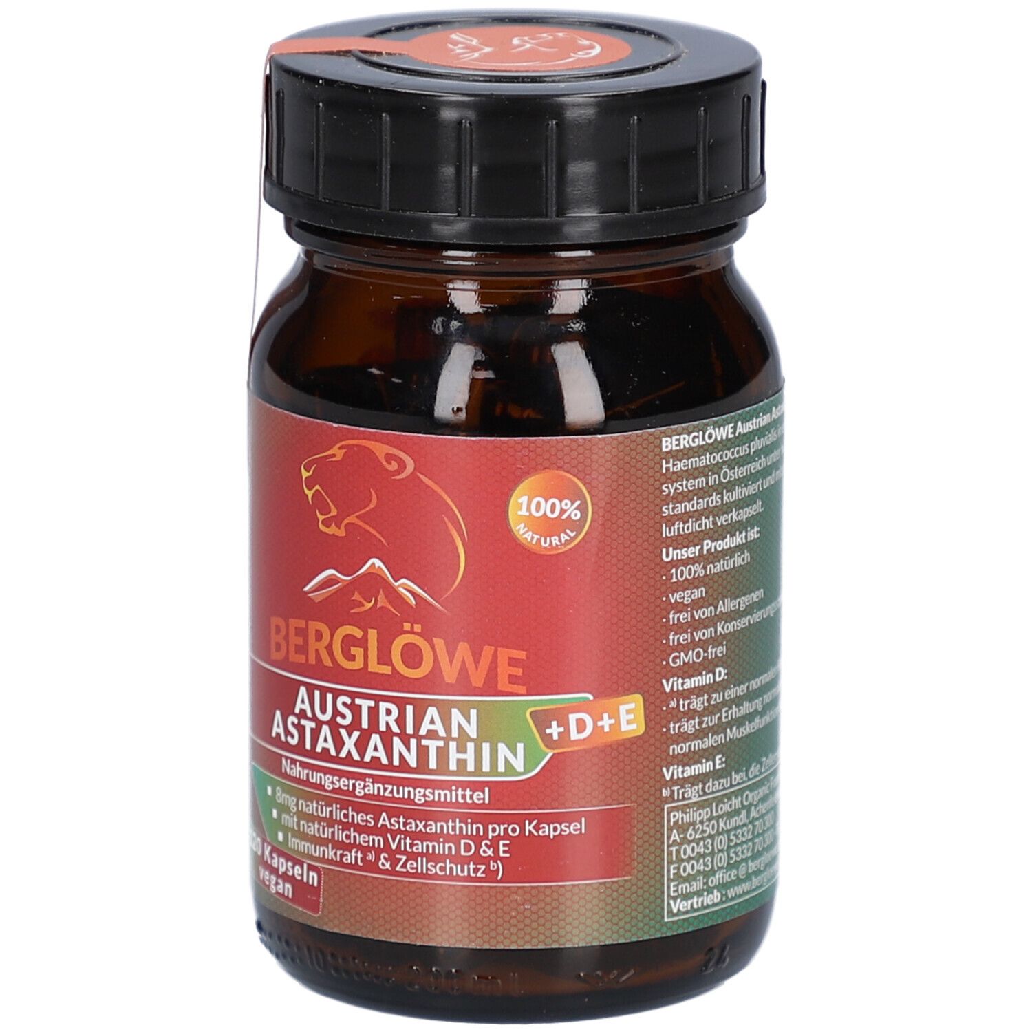 Flacon en verre brun avec bouchon noir. Étiquette "Berglöwe Austrian Astaxanthin" et "100% naturel".