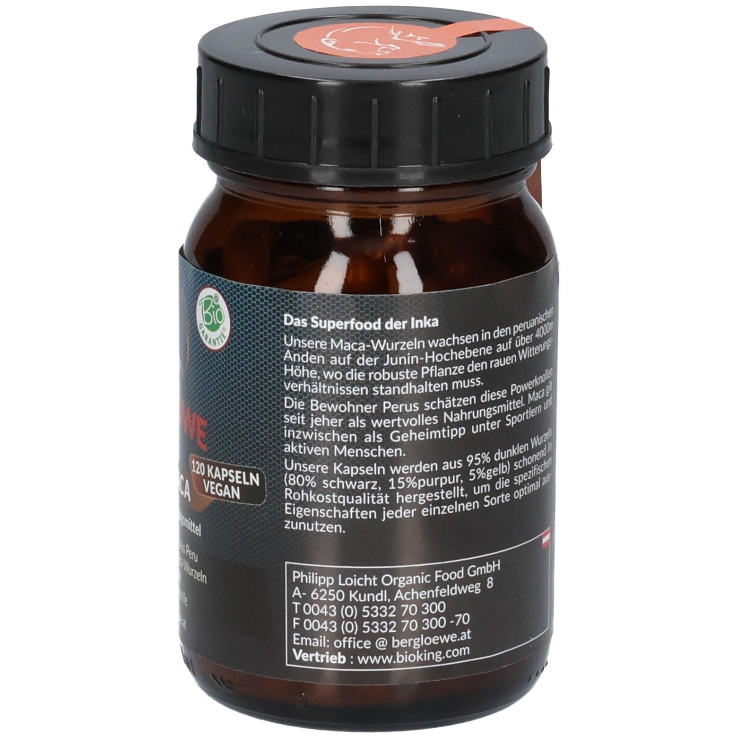 Braune Glasflasche mit schwarzem Deckel. Etikett mit Produktinformationen und Bio-Siegel. Detailansicht.