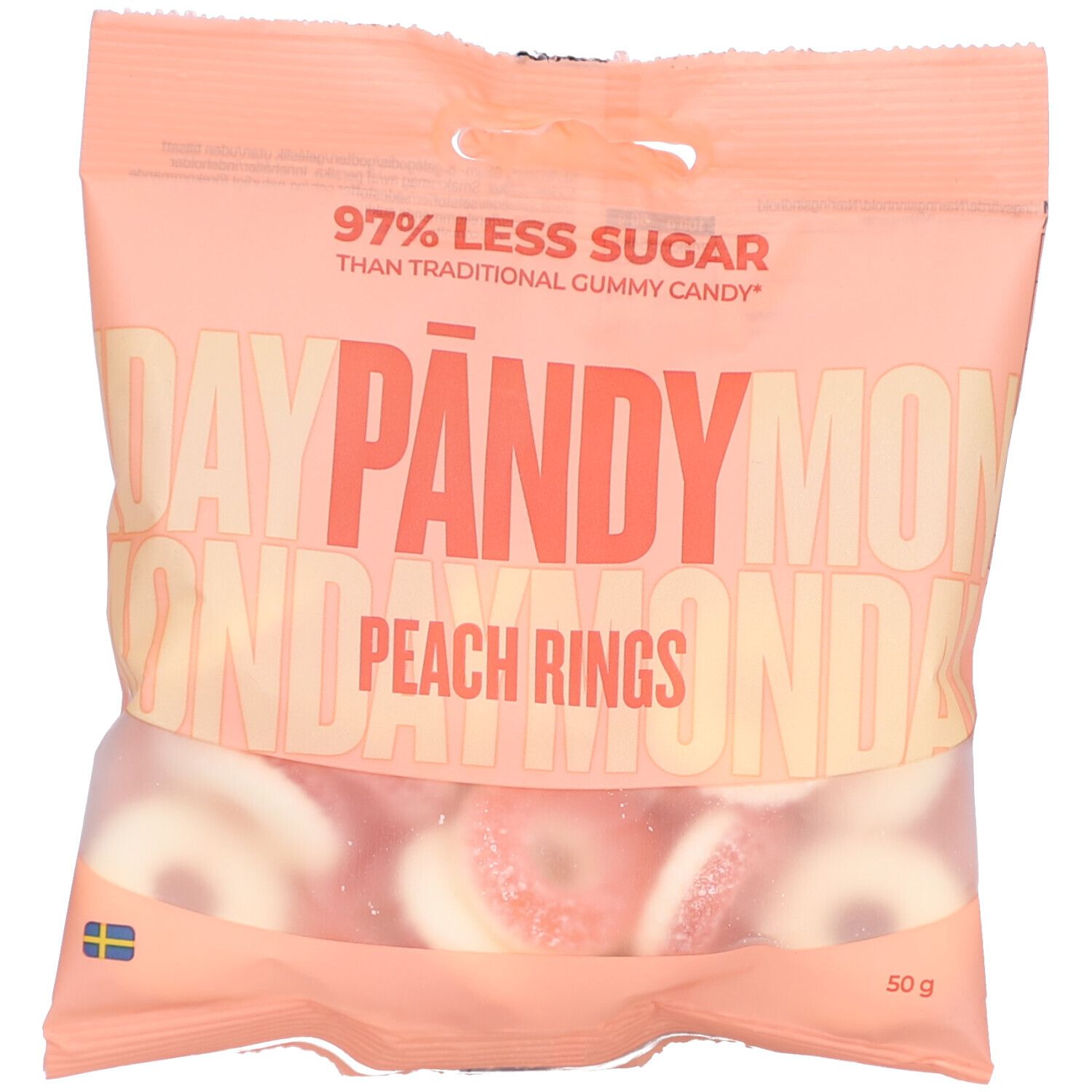 Beutel mit Pfirsichringen. Aufschrift: PÄNDY, Peach Rings, 97% weniger Zucker. Inhalt: 50 g. Schwedische Flagge.