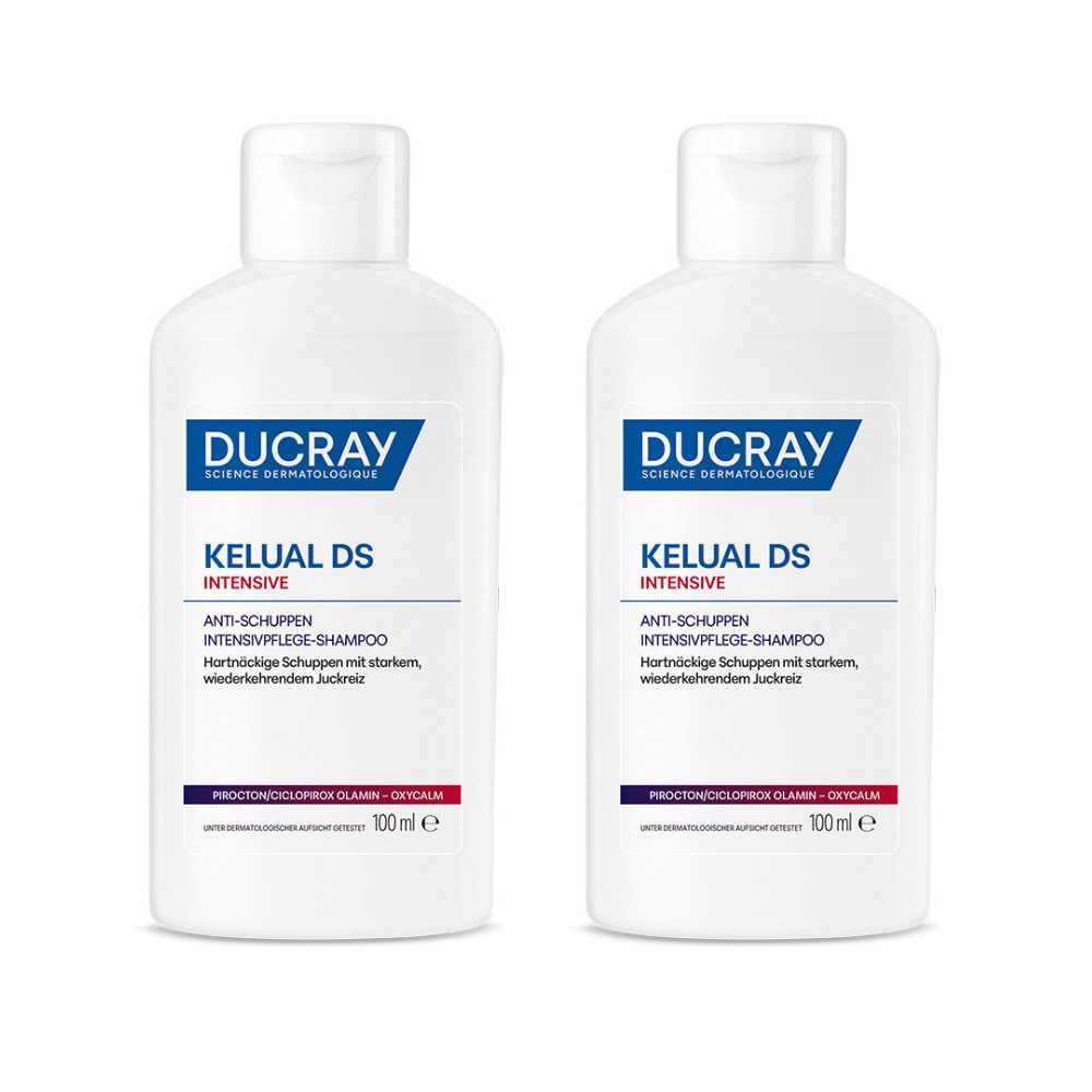 Zwei weiße Flaschen mit blau-weißem Etikett. Aufschrift: DUCRAY KELUAL DS INTENSIVE Anti-Schuppen Intensivpflege-Shampoo.