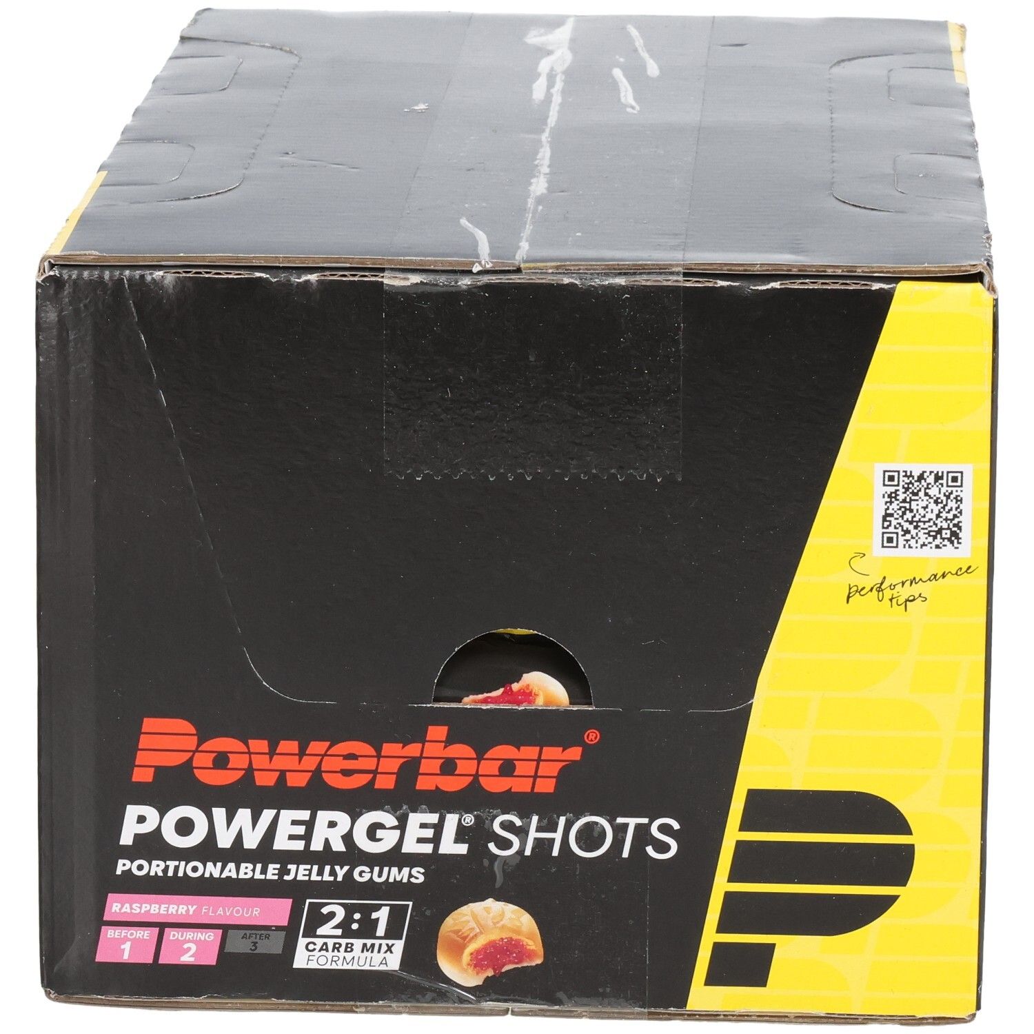 Boîte noire Powerbar Powergel Shots. Inscriptions: framboise, 2:1 Carb Mix, pictogrammes. Accents jaunes et rouges.
