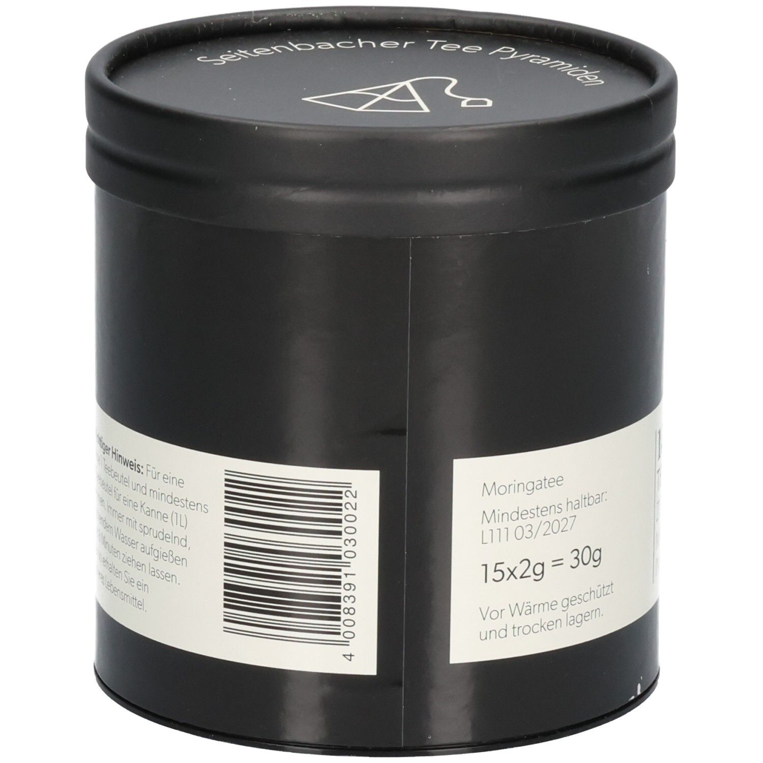 Schwarze Dose mit weißem Etikett. Aufschrift: Moringa Tee. Mindestens haltbar bis 03/2027. 15x2g = 30g. Für Wärme geschützt und trocken lagern.