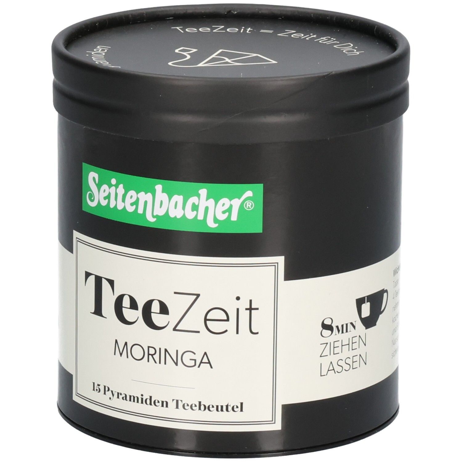 Schwarze Dose mit grünem Seitenbacher-Logo und weißem Etikett. Aufschrift: TeeZeit MORINGA, 15 Pyramiden Teebeutel. 8 Min. ziehen lassen.