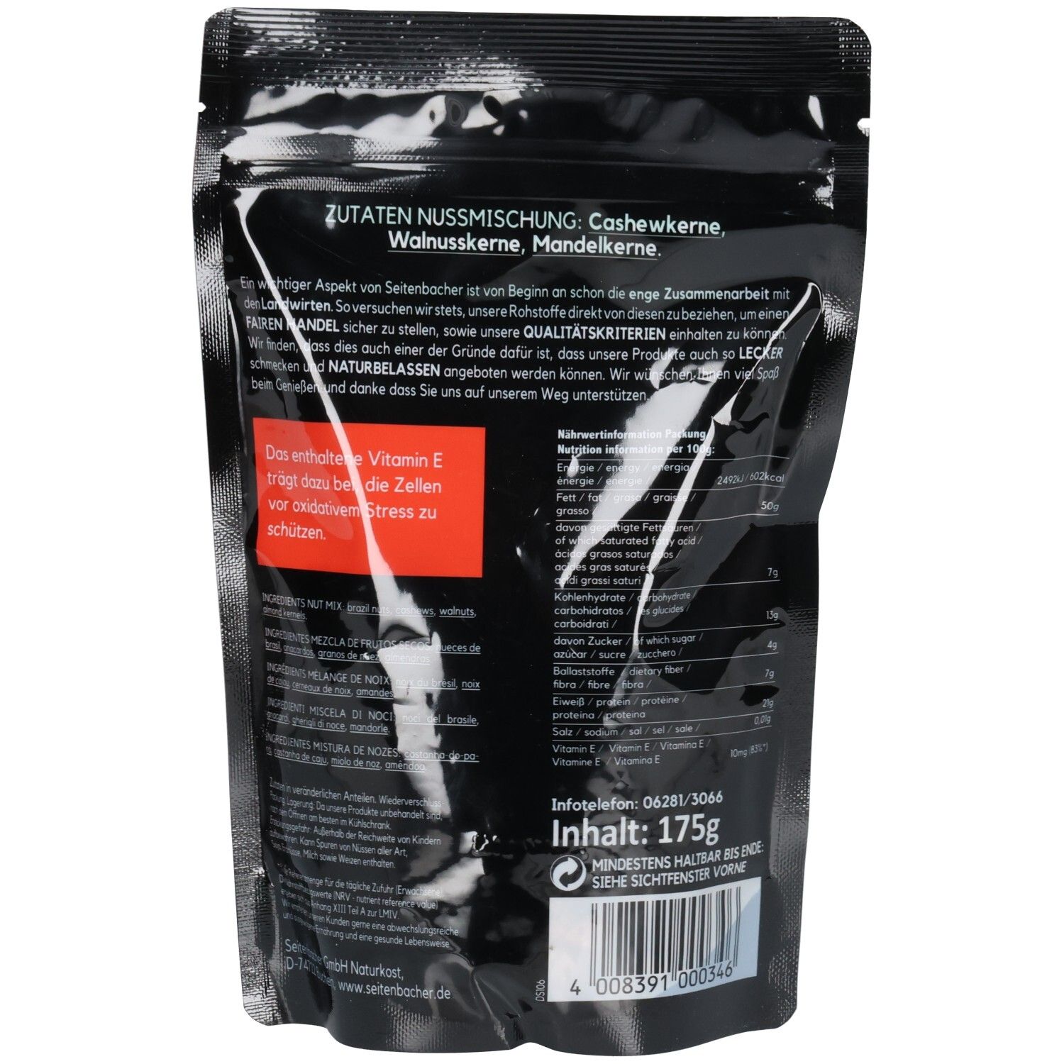 Dos du sachet. Fond noir avec texte. Bande rouge. Contient des informations sur les ingrédients et les valeurs nutritionnelles.