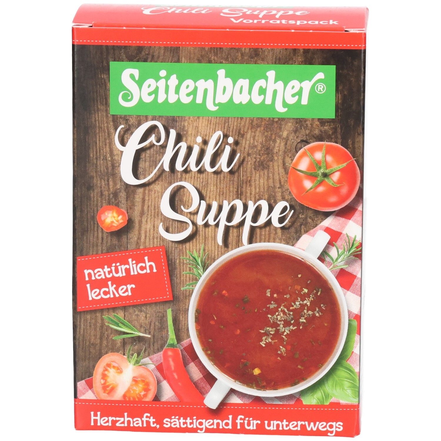 Seitenbacher Chili Suppe Verpackung. Rote Box mit Produktbild und Text. Enthält Tomaten, Chili und Suppe. "Natürlich lecker".