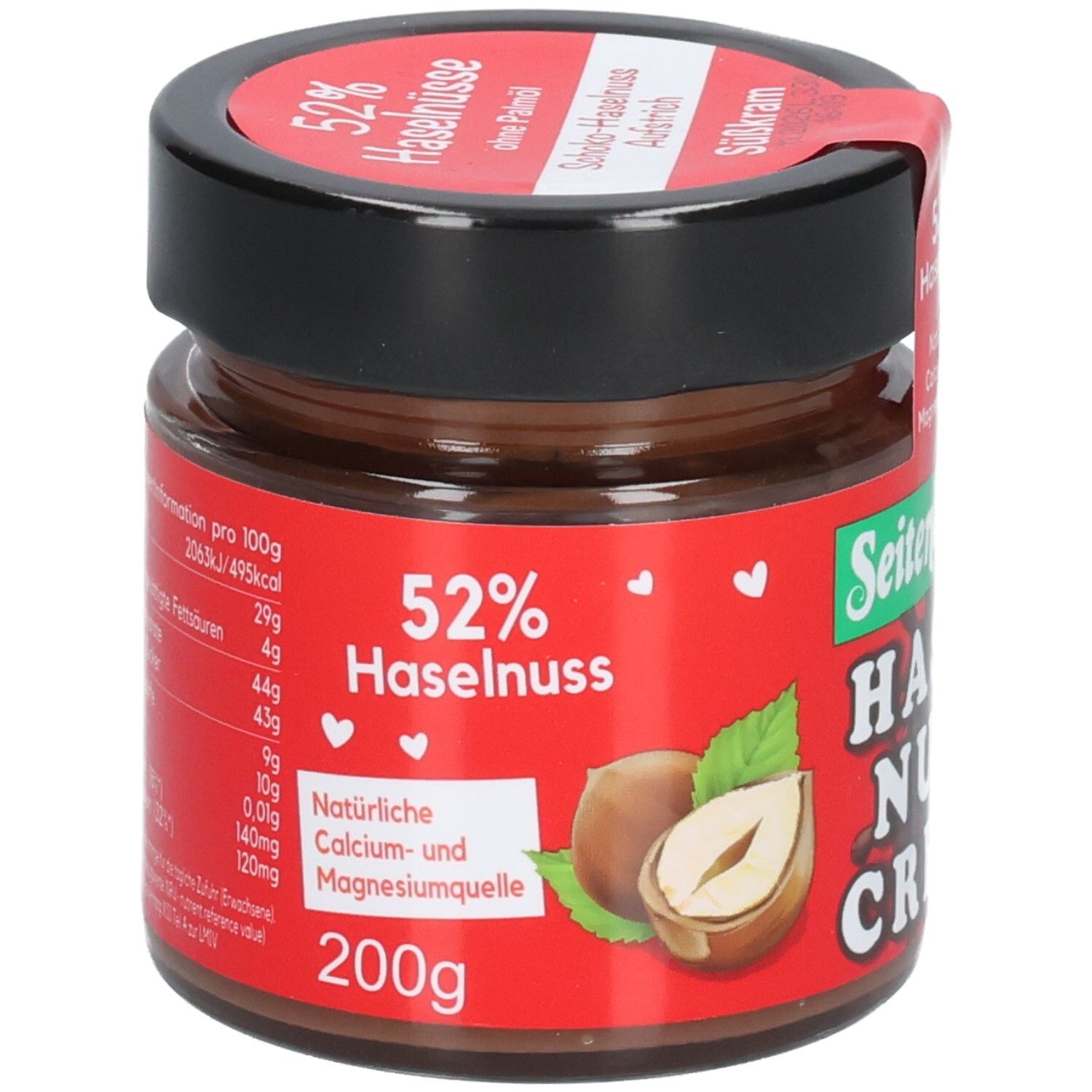 Pot de crème au chocolat et aux noisettes. Étiquette rouge avec 52% de noisettes et informations nutritionnelles. Marque: Seitenbacher. 200g.