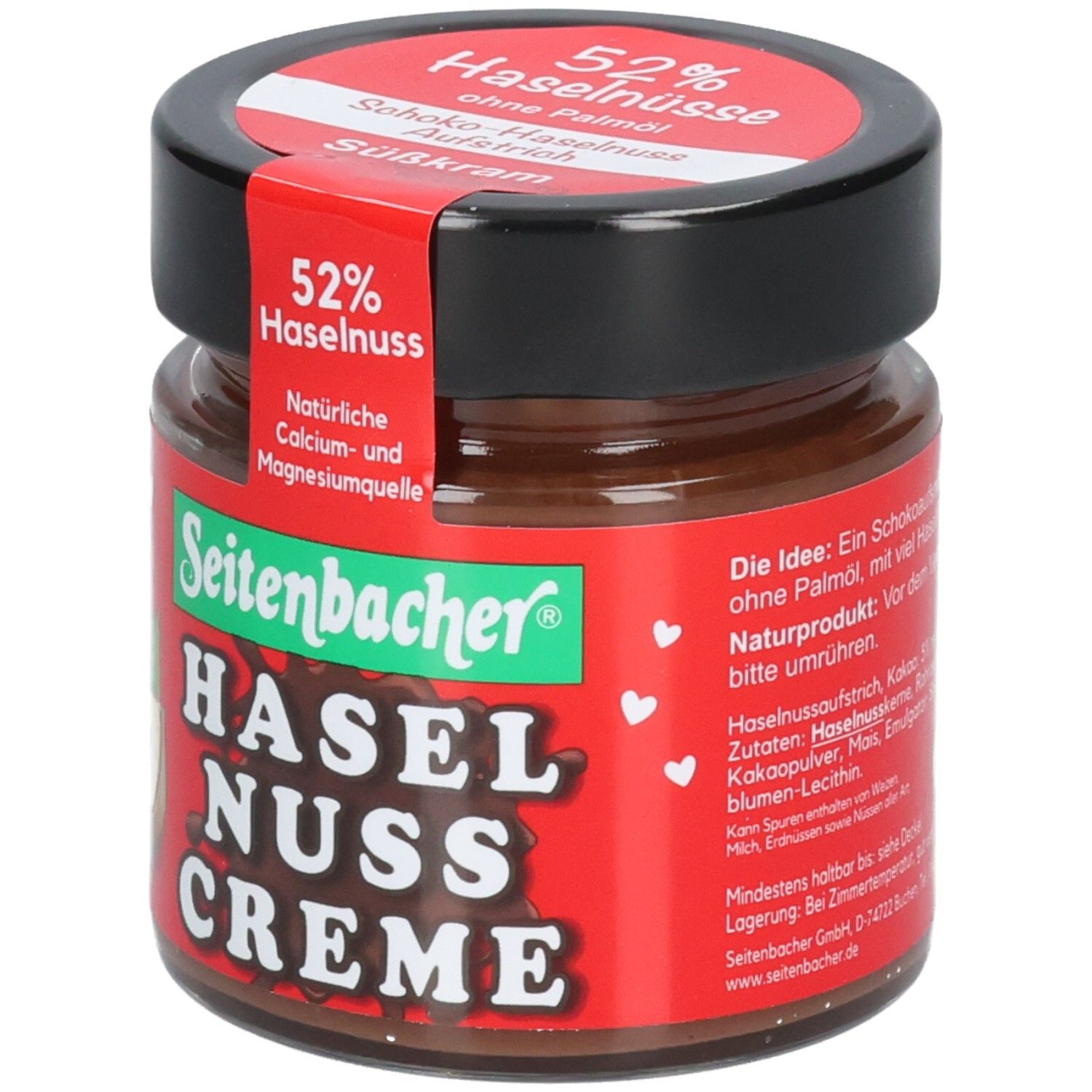 Pot de crème au chocolat et aux noisettes. Étiquette rouge avec 52% de noisettes. Marque : Seitenbacher. Couvercle noir.
