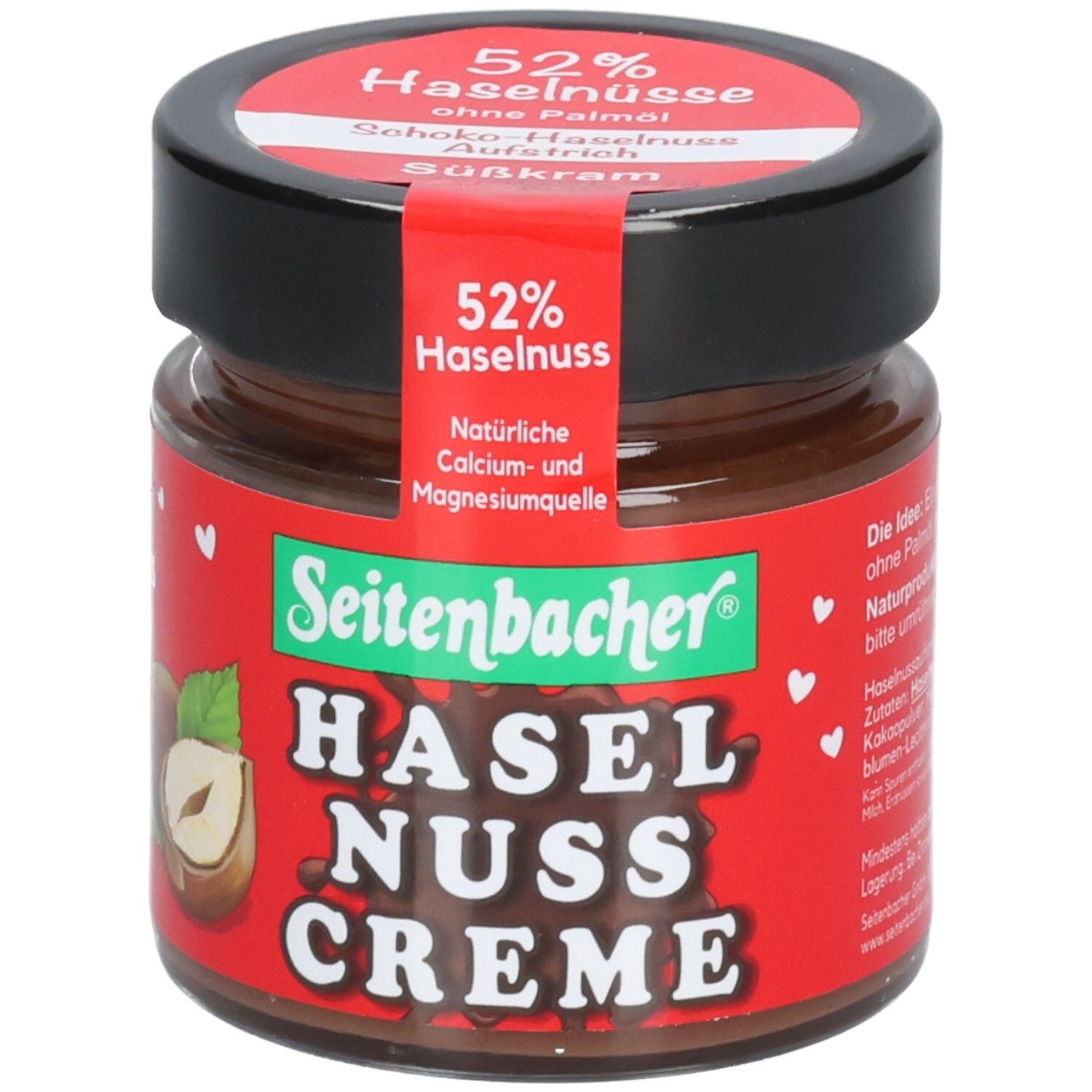 Pot de crème au chocolat et aux noisettes. Étiquette rouge avec 52% de noisettes. Marque : Seitenbacher. Couvercle noir.