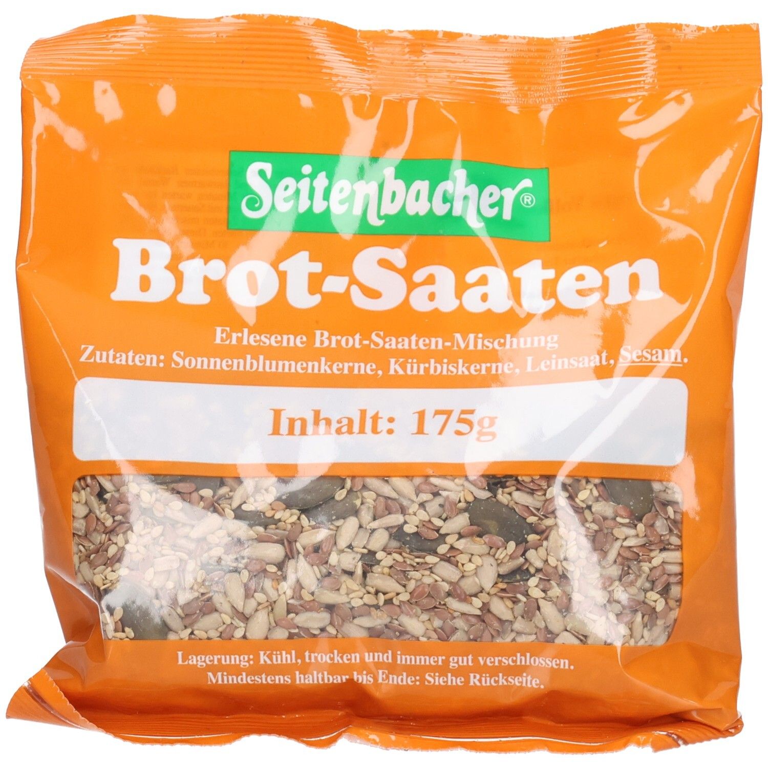 Transparente Verpackung mit Brot-Saaten. Aufdruck: Seitenbacher, Brot-Saaten, Inhalt 175g. Zutaten: Sonnenblumenkerne, Kürbiskerne, Leinsaat, Sesam.