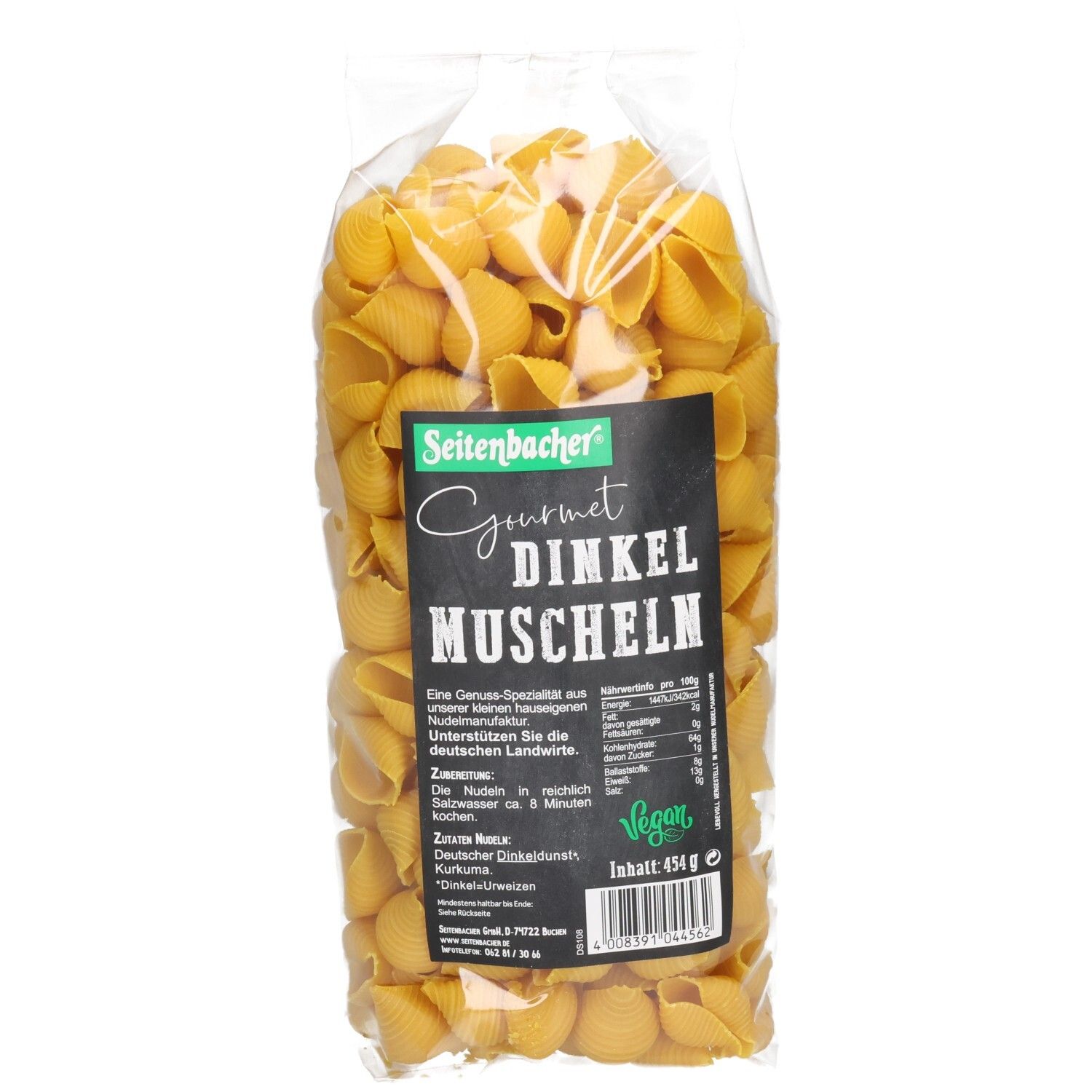 Klarsichtbeutel mit Seitenbacher Dinkel Muscheln. Schwarzes Etikett mit Produktinformationen. Vegan-Siegel.